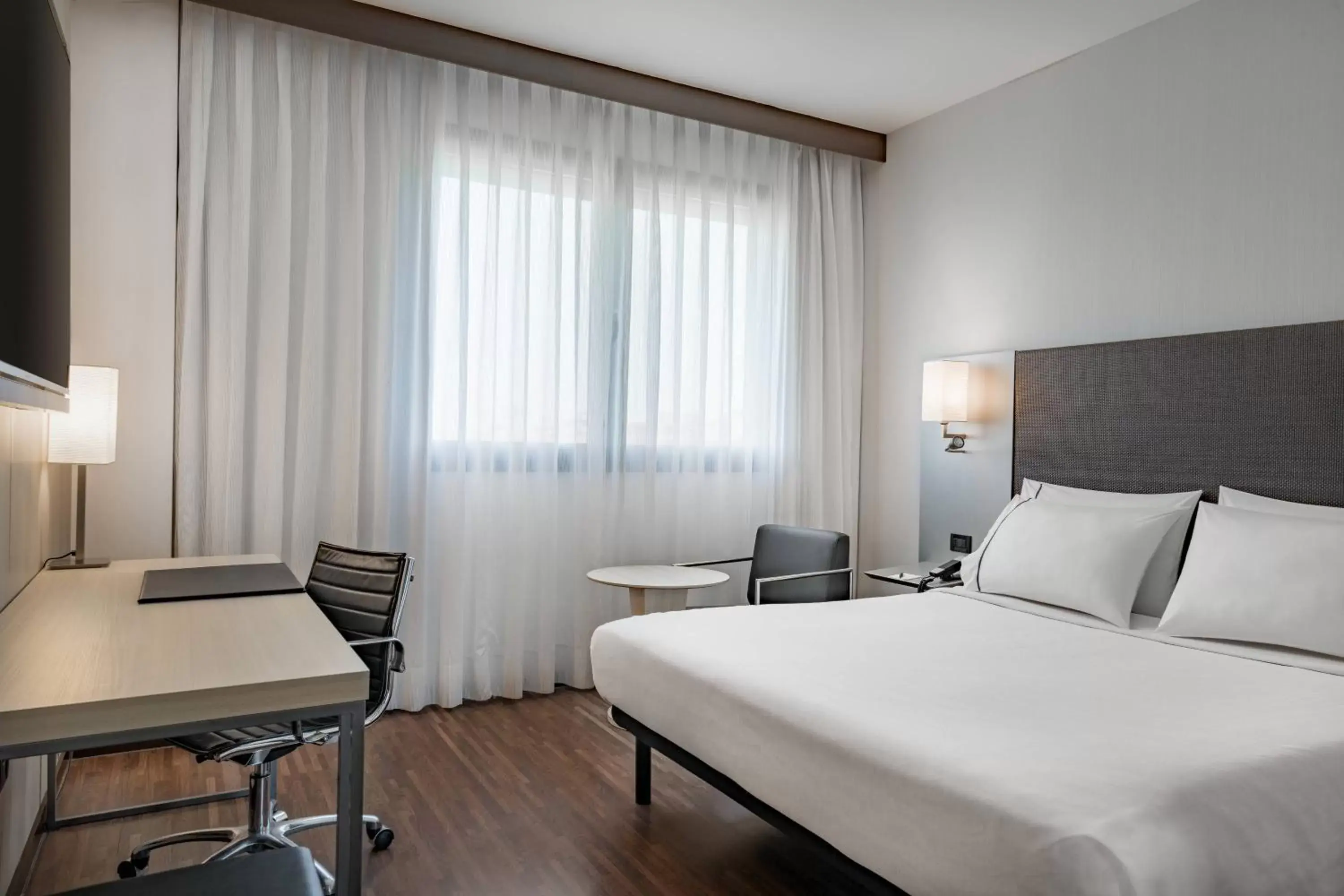 Photo of the whole room, Bed in AC Hotel Bologna by Marriott