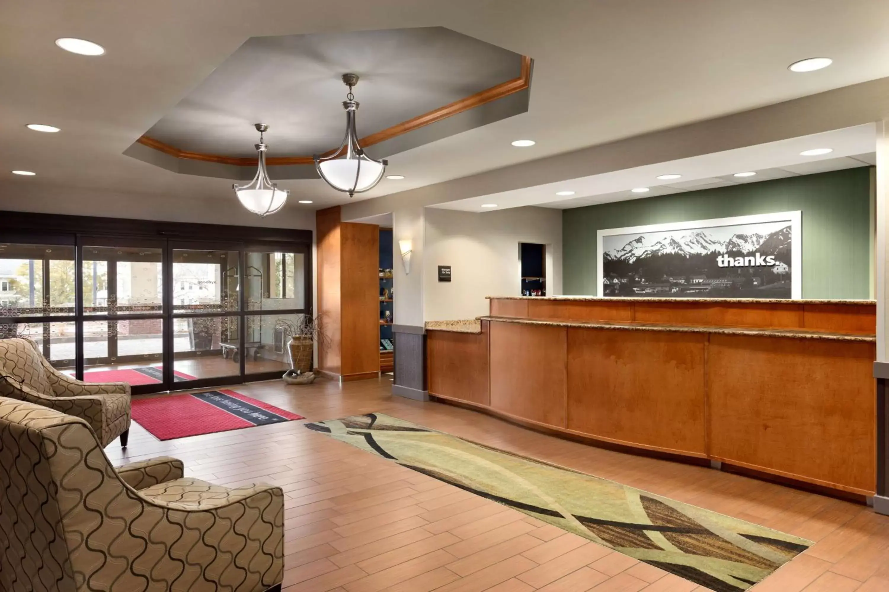 Lobby or reception in Hampton Inn & Suites by Hilton Manchester Bedford Lobby or reception in Hampton Inn & Suites by Hilton Manchester Bedford