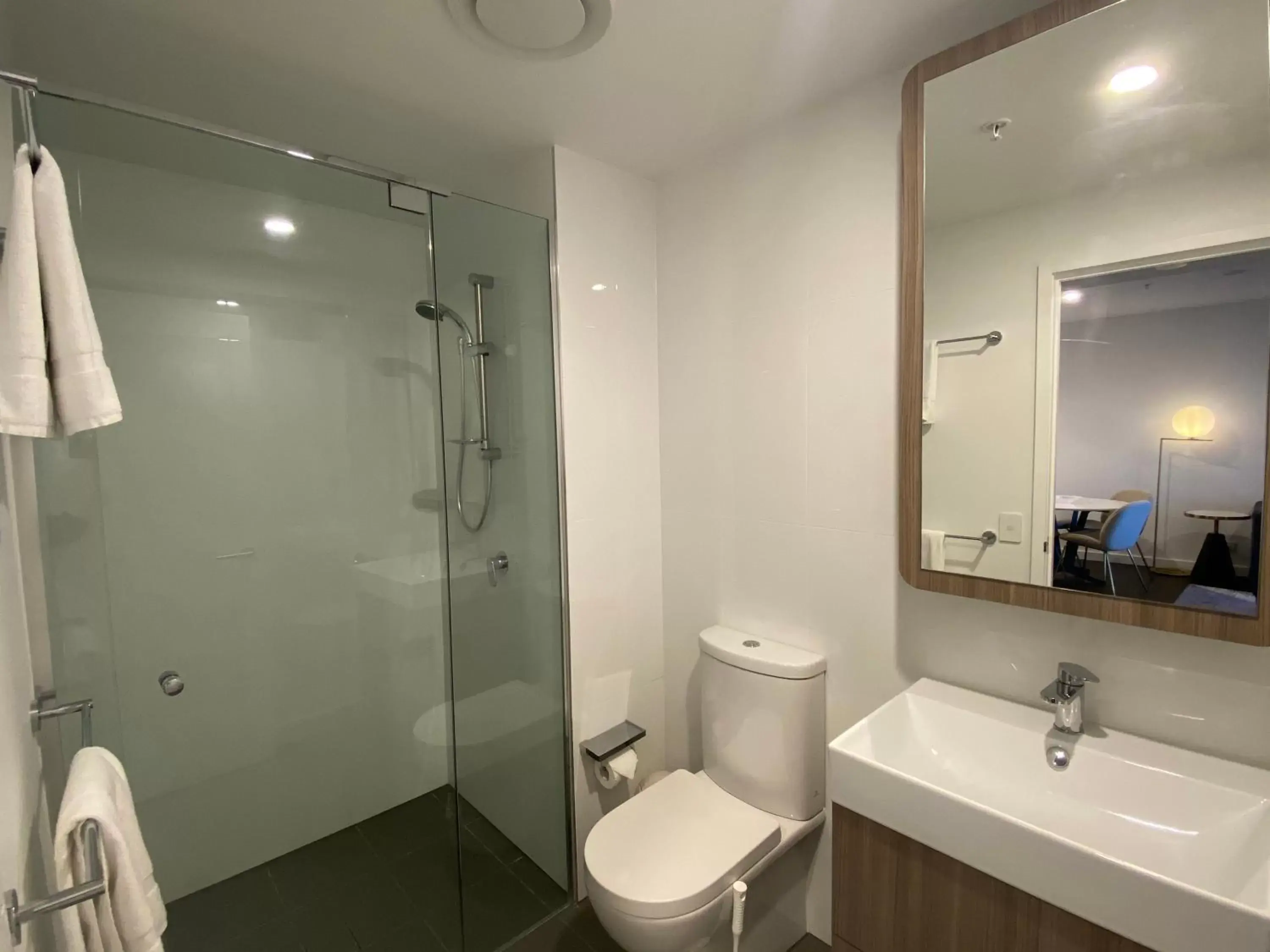 Shower, Bathroom in Brisbane One Apartments by CLLIX