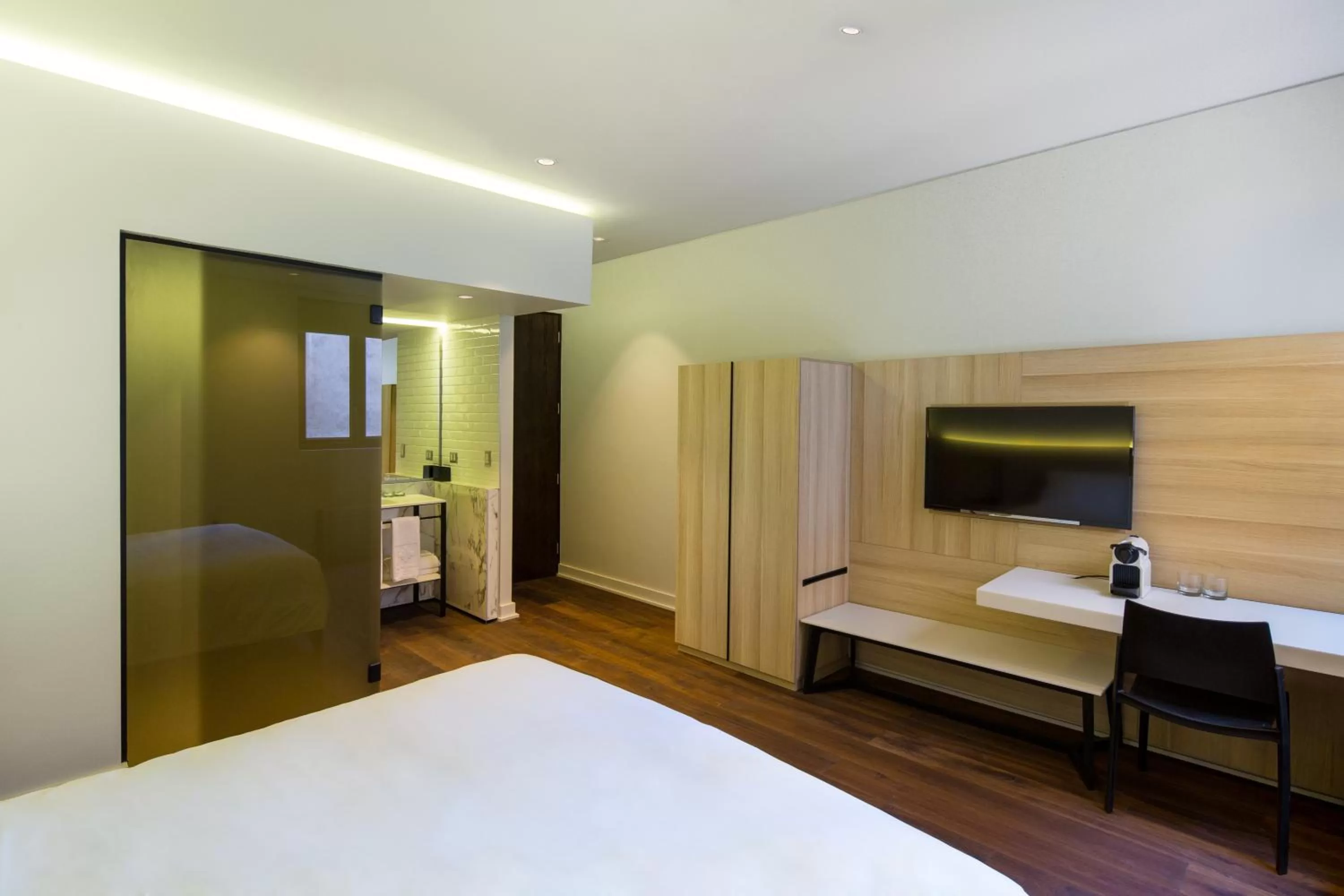 Seating area, Bed in Hotel Altiplanico Bellas Artes