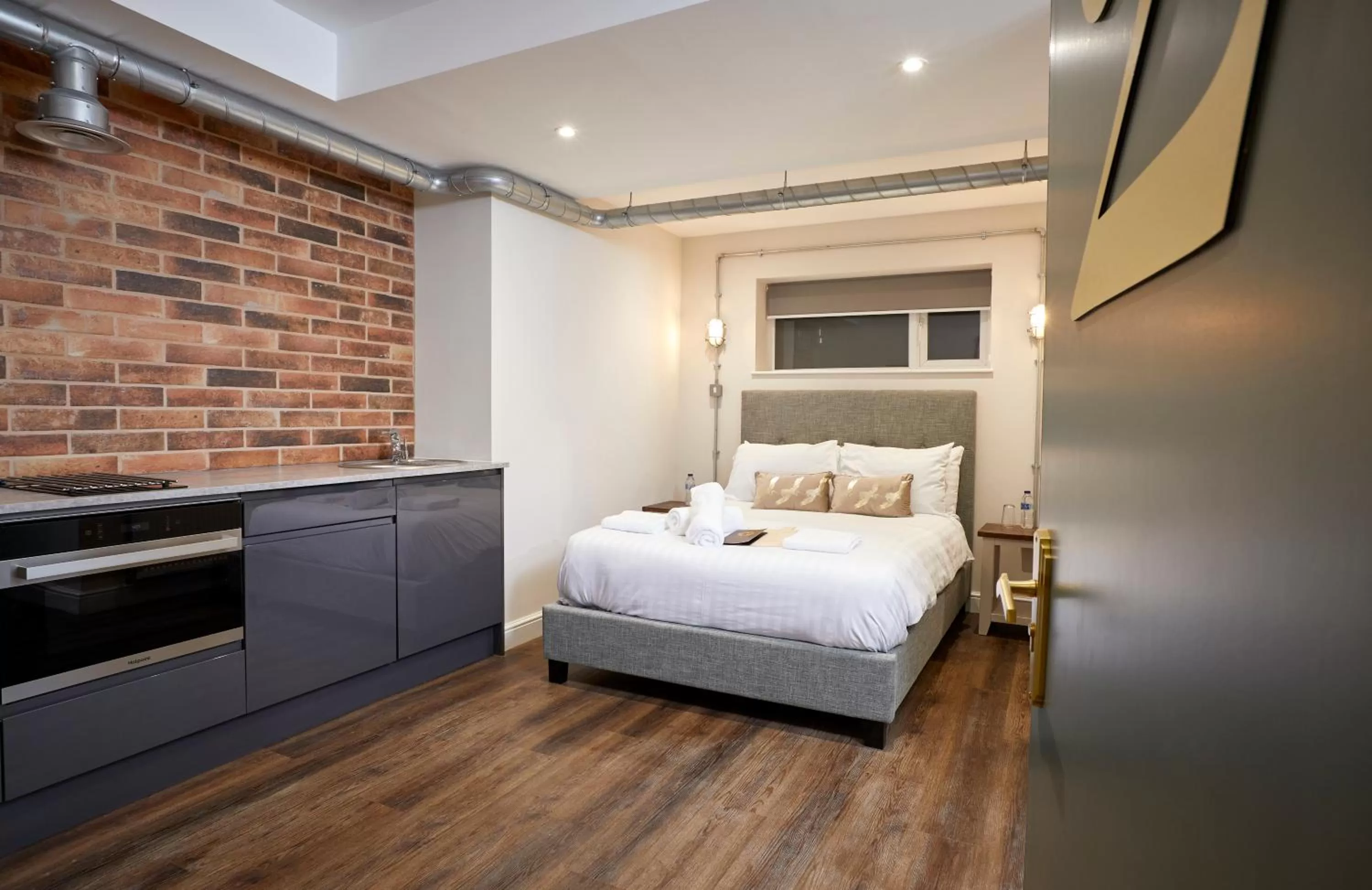 Bed in Three Cranes Serviced Apartments