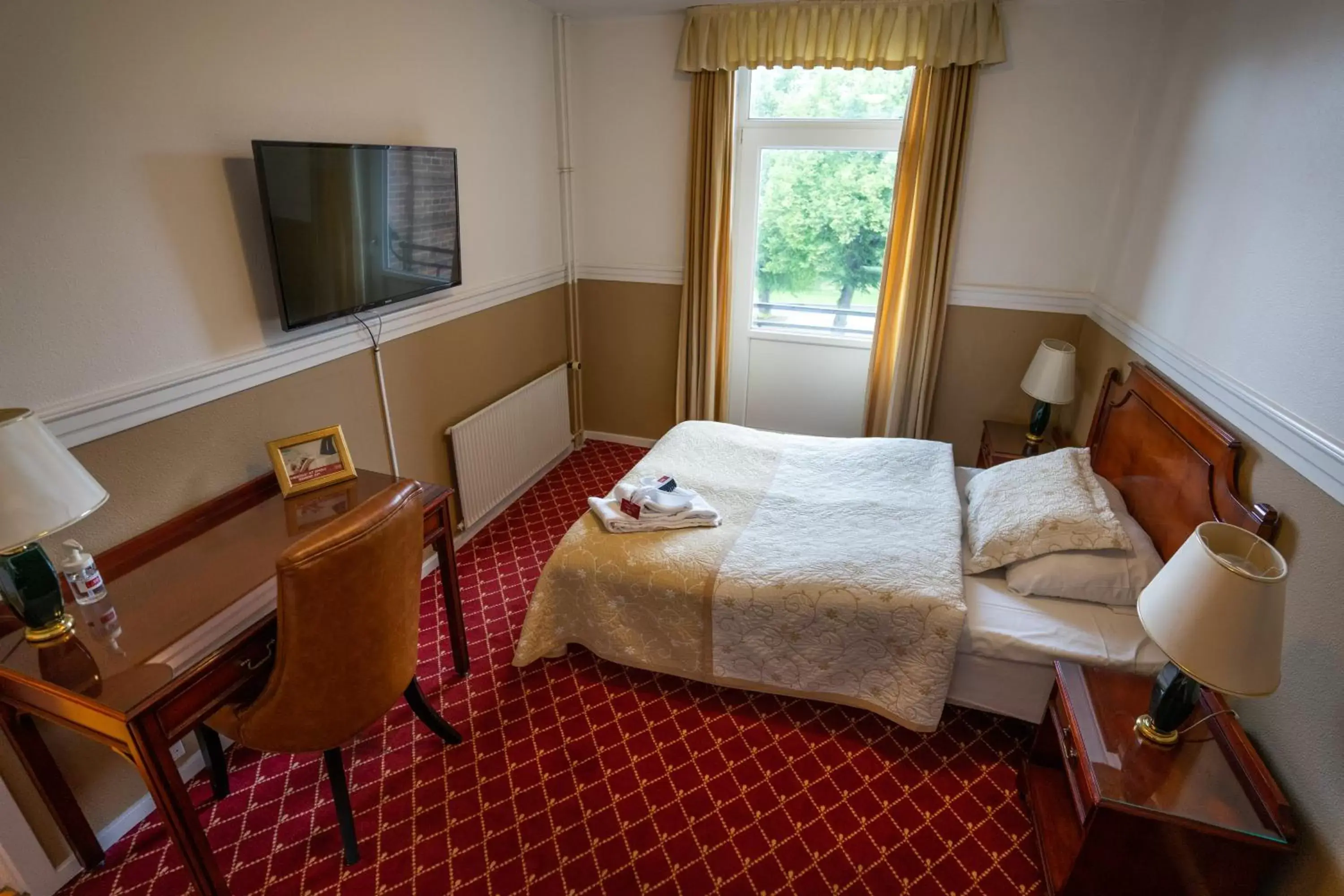 Bedroom in Milling Hotel Plaza