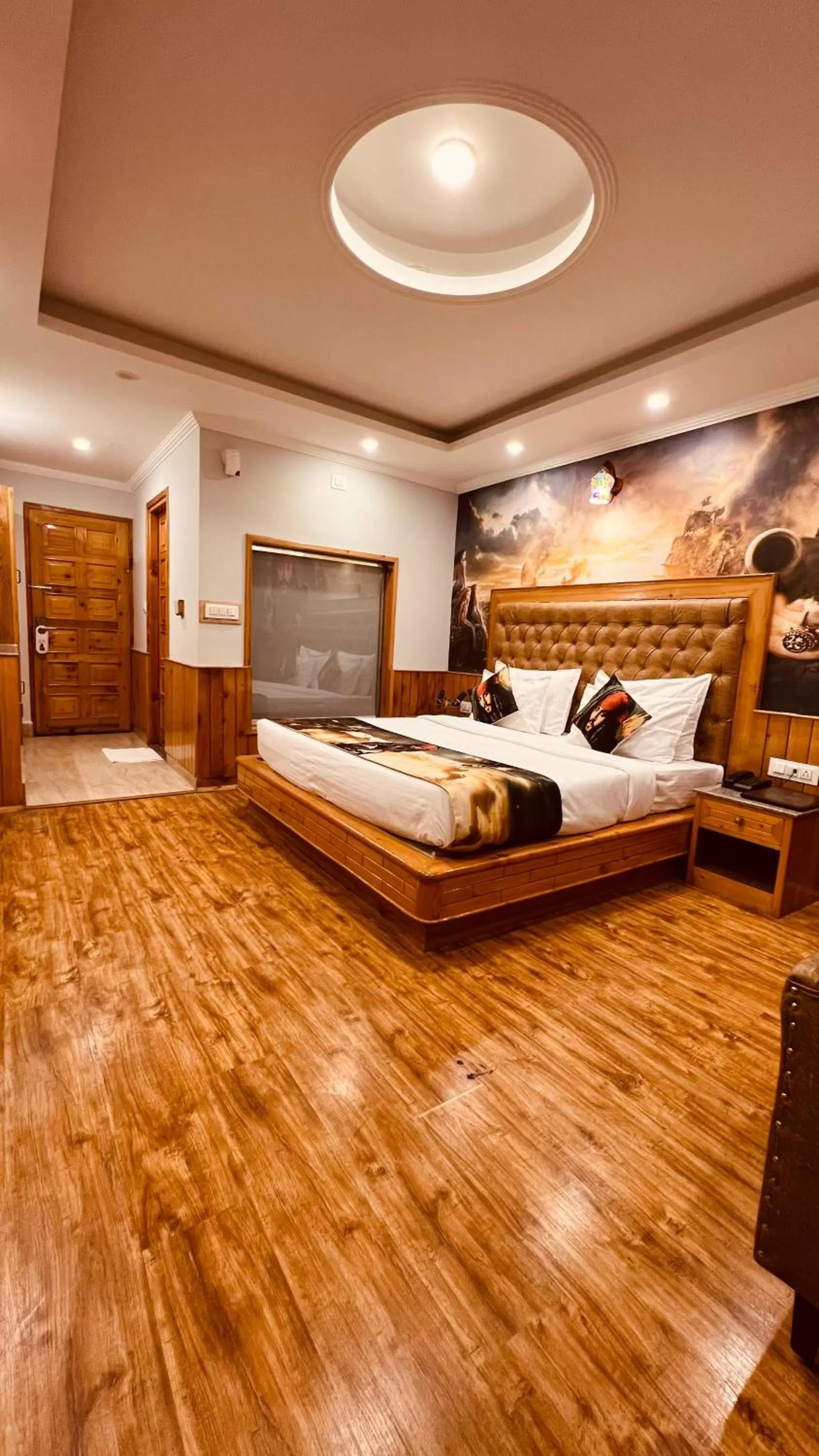 Bed, Seating Area in Hotel Old Smugglers with Balcony mountain view(A/C hot and Cold)