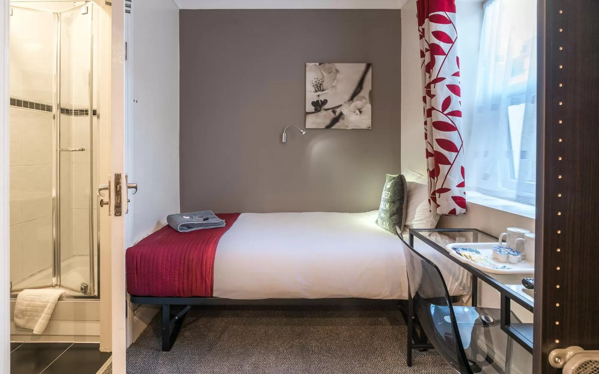 Bed in Hellenic Hotel by Saba