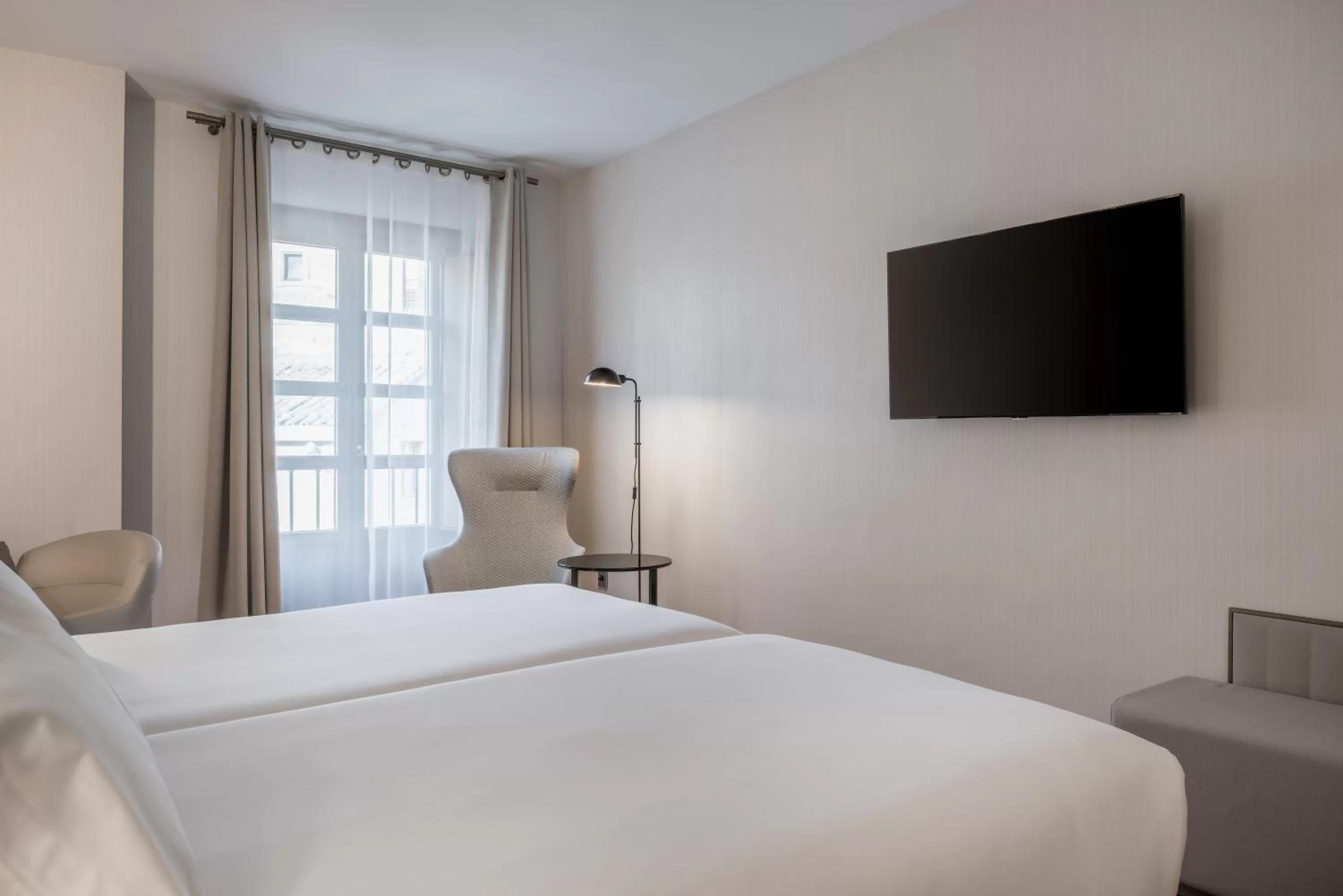 Bed in NH Collection Salamanca Palacio de Castellanos