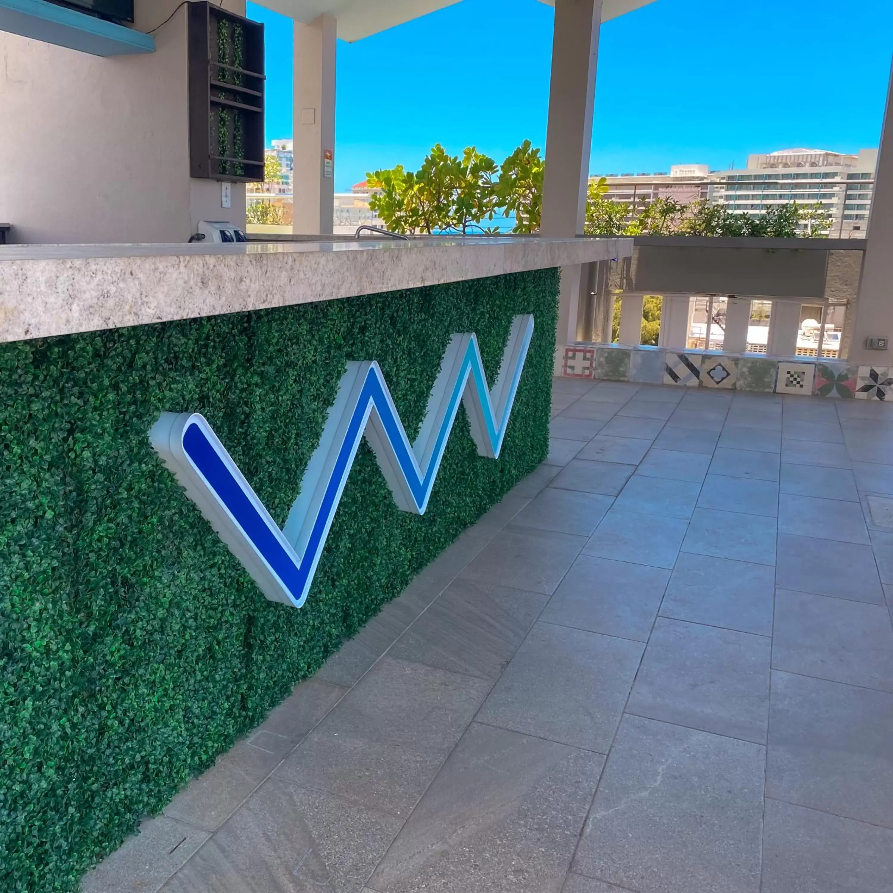 Lounge or bar, Property Logo/Sign in The Wave Hotel Condado