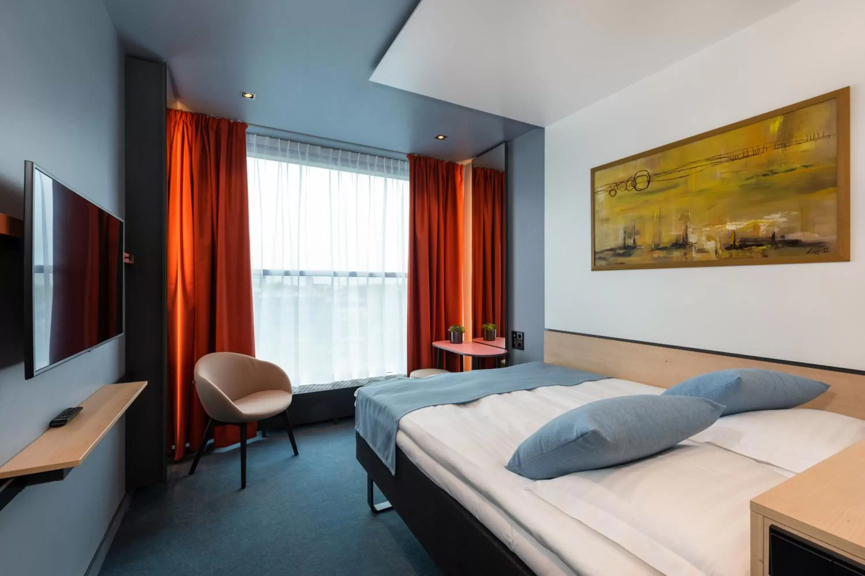 Bed in Art Hotel Pallas by Tartuhotels