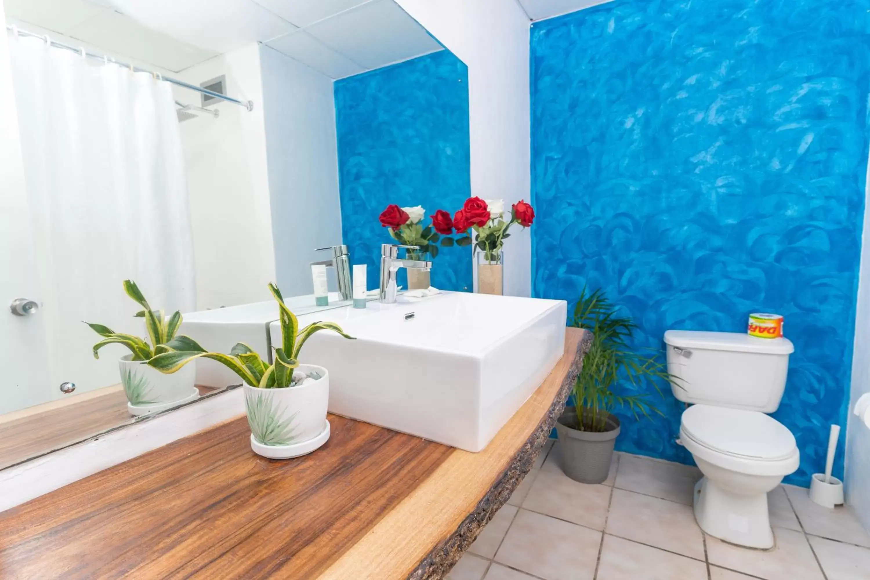 Bathroom in Sand and Tan Beach Hotel