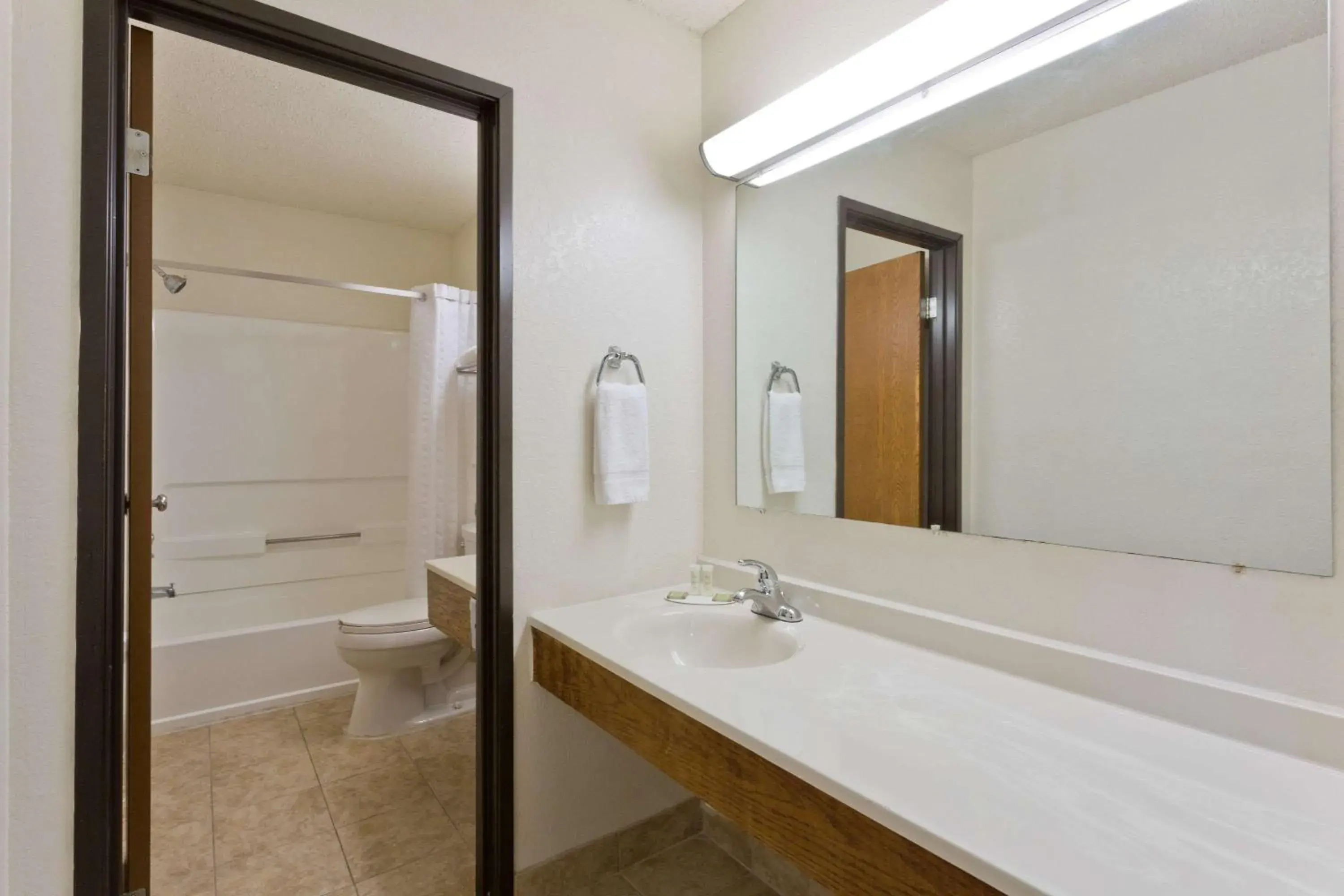 Photo of the whole room, Bathroom in Super 8 by Wyndham Lexington Park/California Area