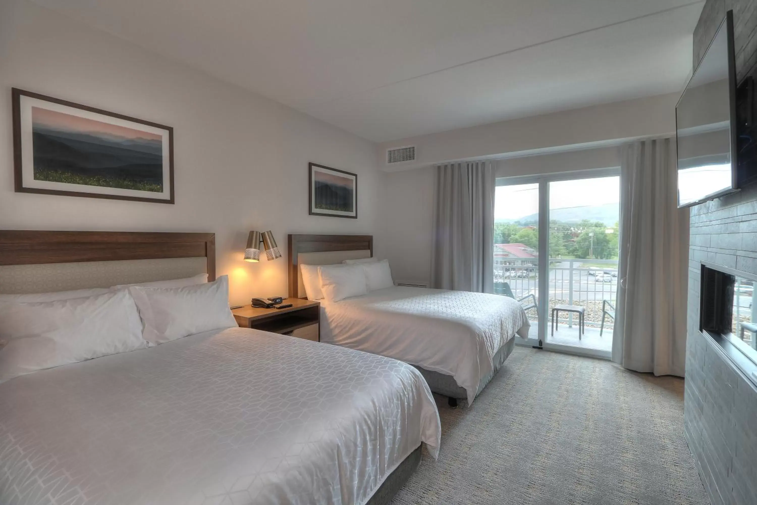 Balcony/Terrace, Bed in Holiday Inn & Suites Pigeon Forge Convention Center by IHG Balcony/Terrace, Bed in Holiday Inn & Suites Pigeon Forge Convention Center by IHG