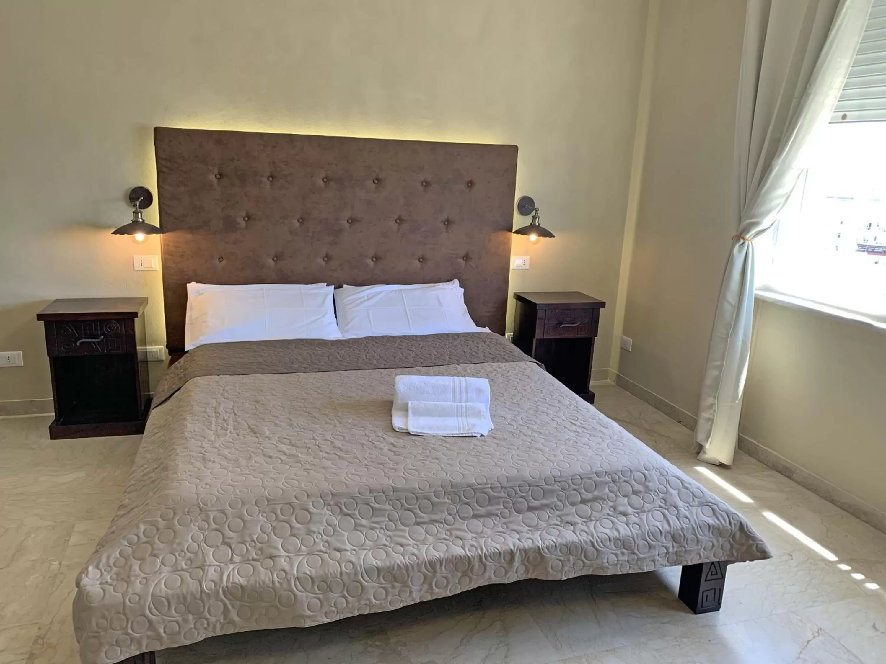 Bedroom, Bed in L'Attico di Piazza Mazzini Rooms