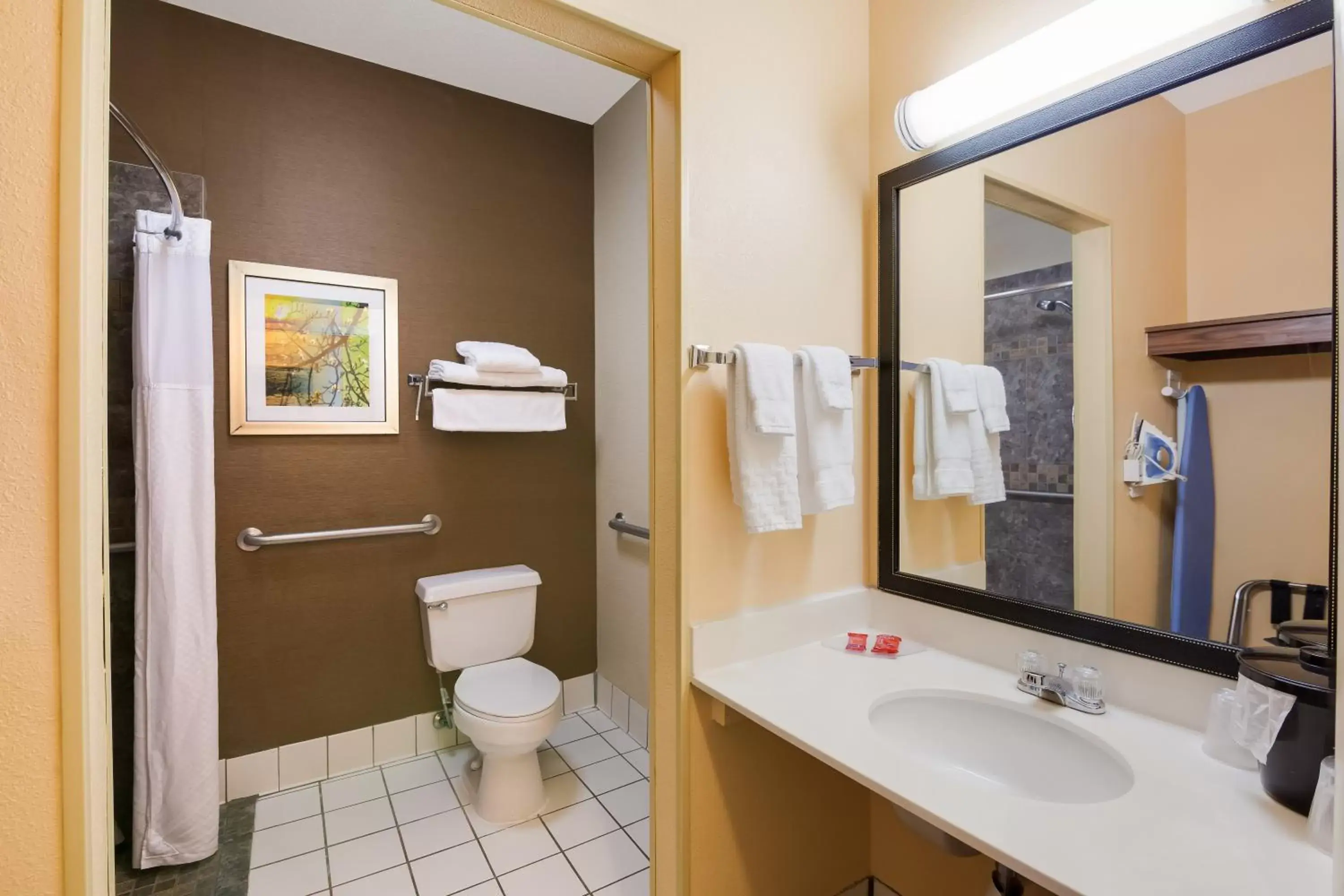 Bathroom in SureStay Plus Hotel by Best Western Minot