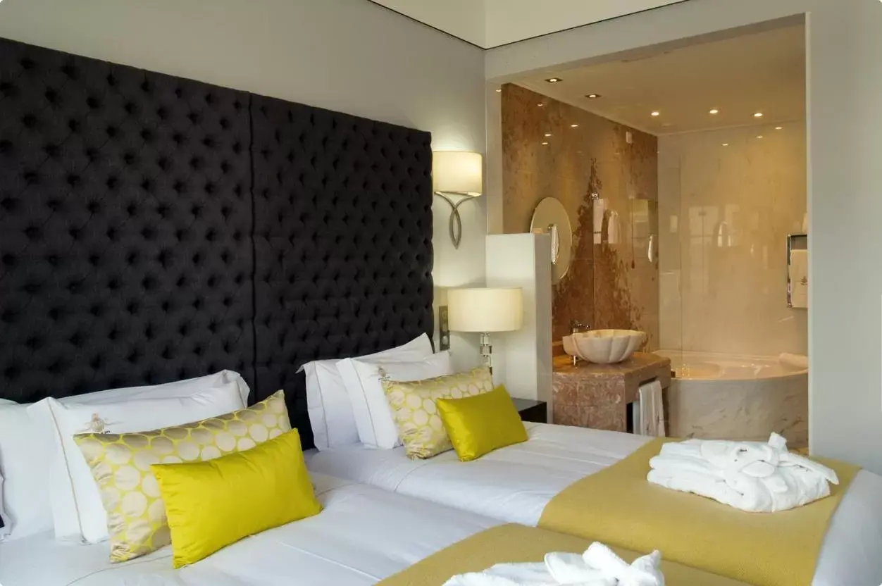 Bedroom, Bed in Alentejo Marmòris Hotel & Spa, a Small Luxury Hotel of the World