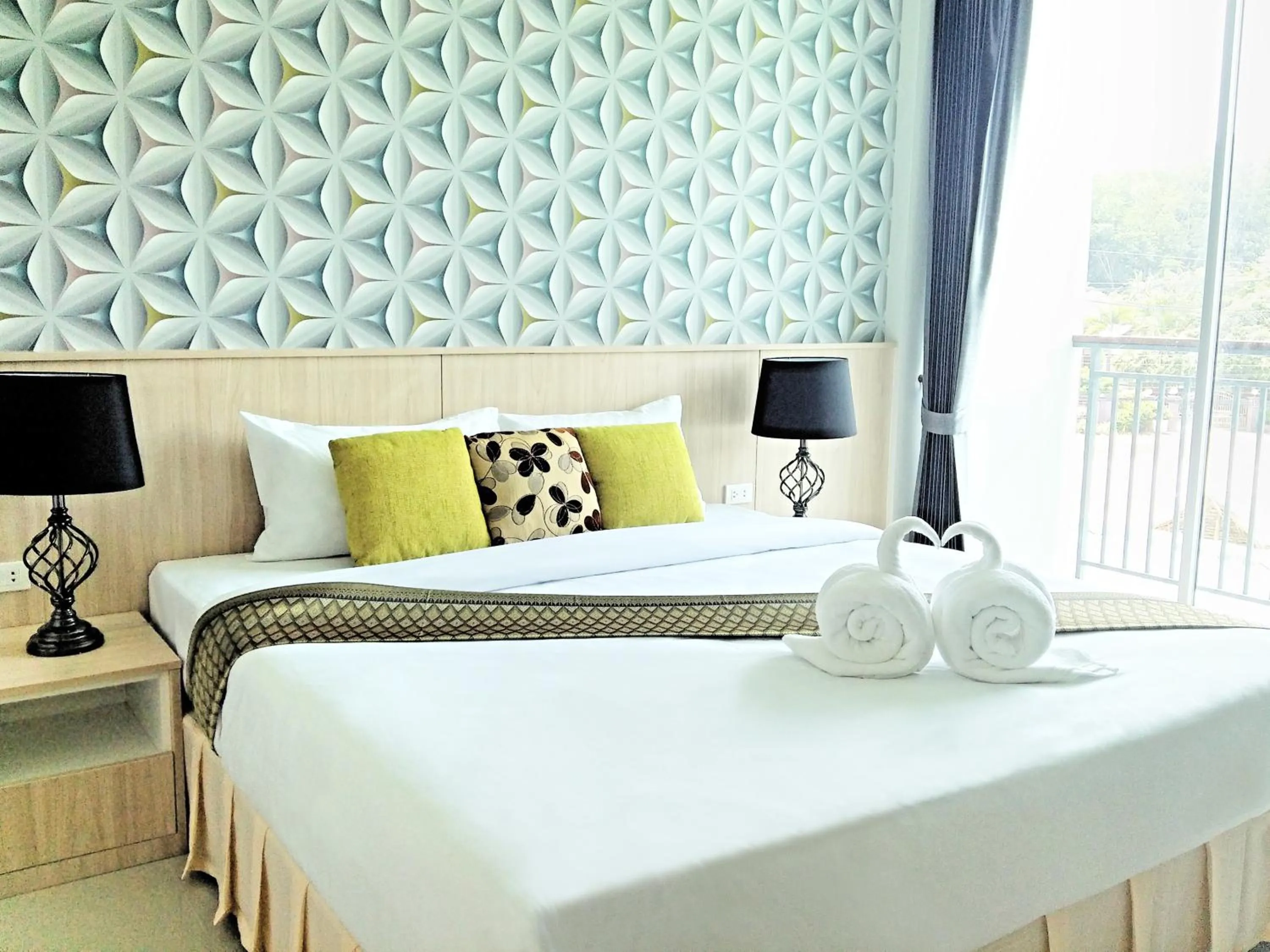 Bed in The Wings Boutique Hotels Krabi Ko Lanta
