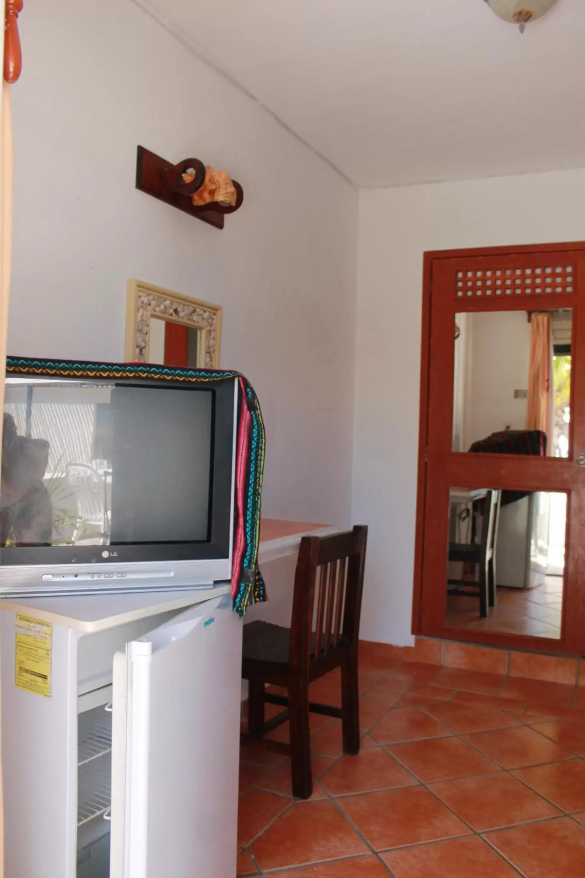 TV and multimedia, TV/Entertainment Center in Hotel Villa Kiin