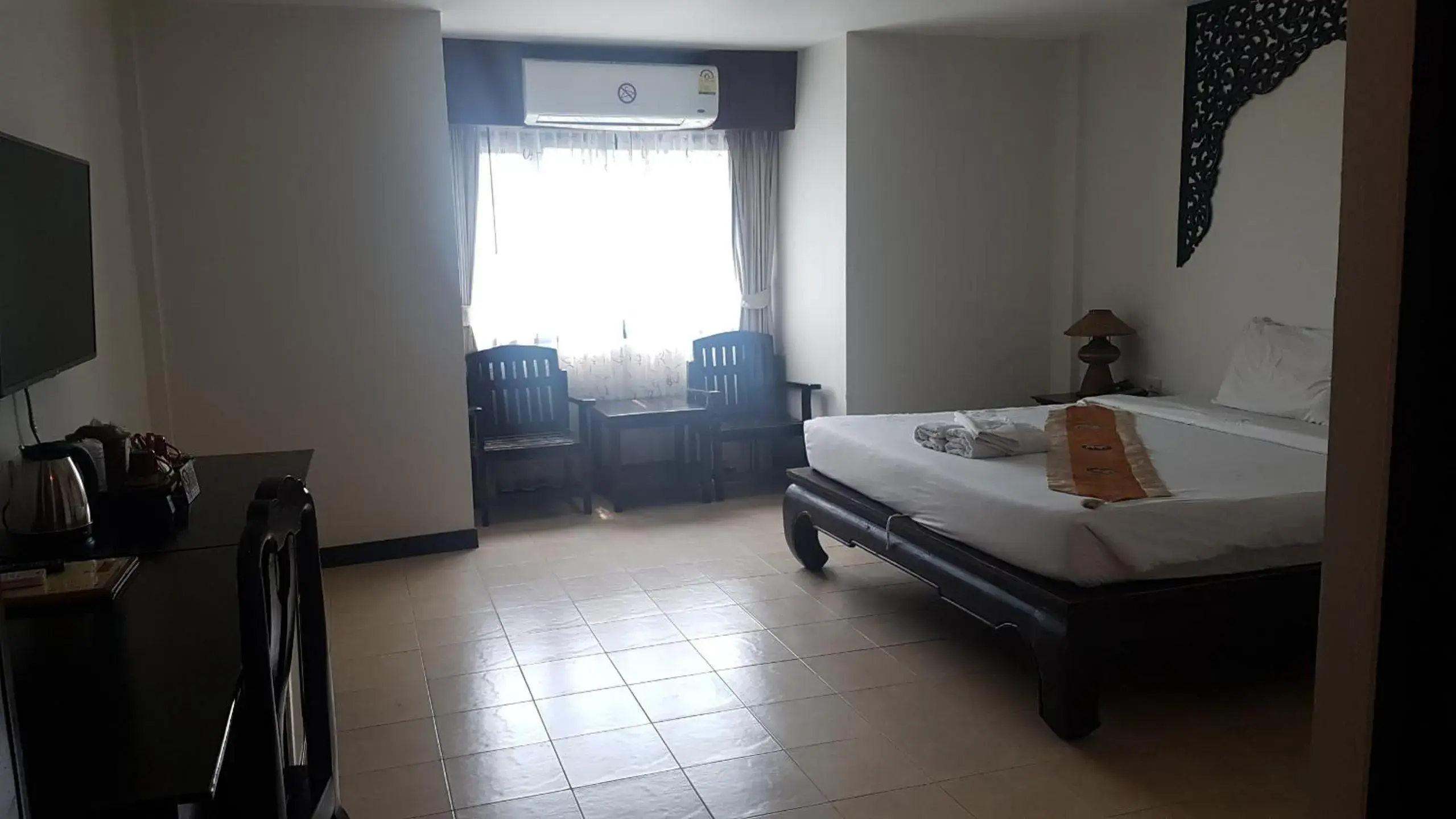 Bed in Wangburapa Grand Hotel