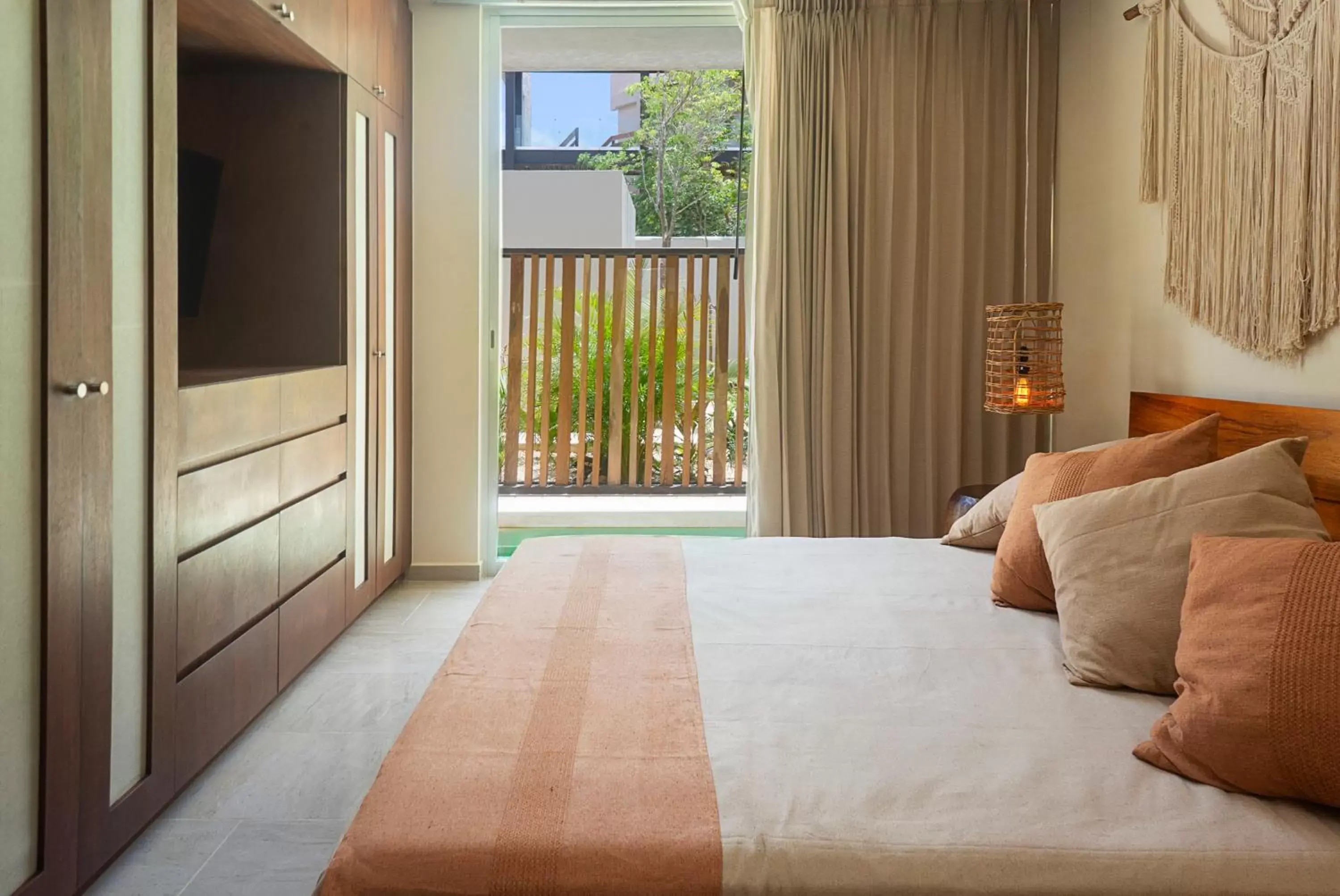 Bed in ARUNA TULUM-Luxury Studios & Apartments