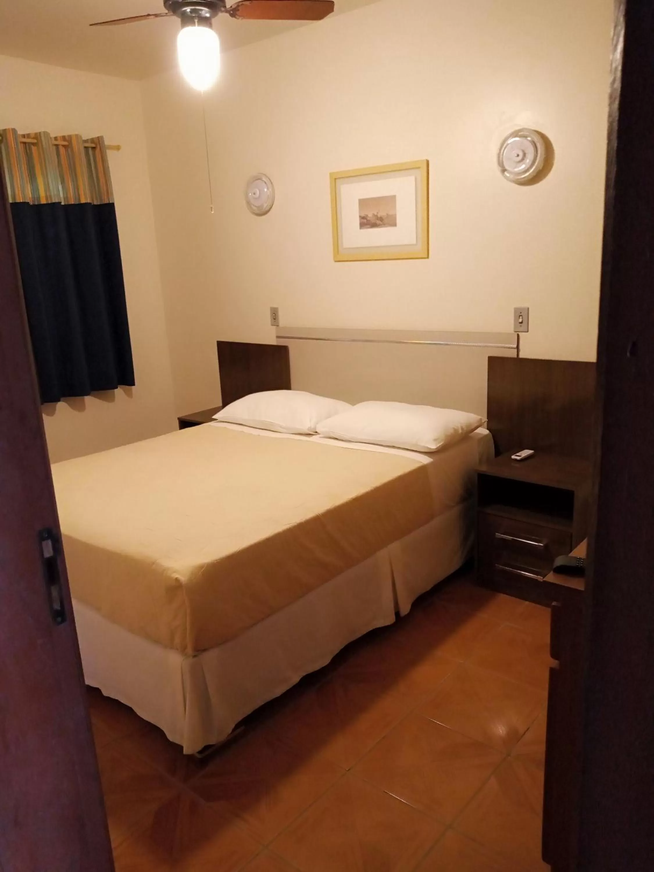 Bed in Pousada Japeju