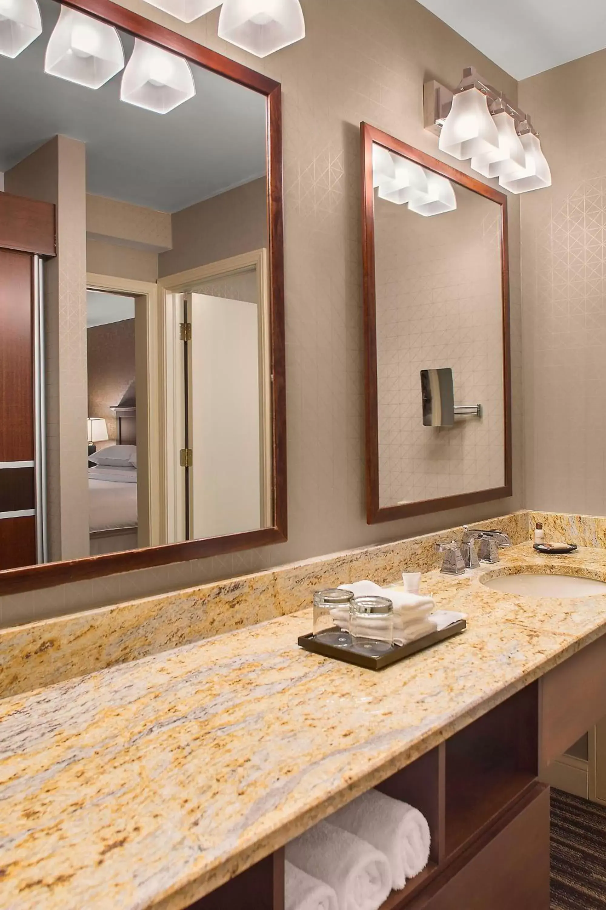 Bedroom, Bathroom in Sheraton Suites Akron Cuyahoga Falls