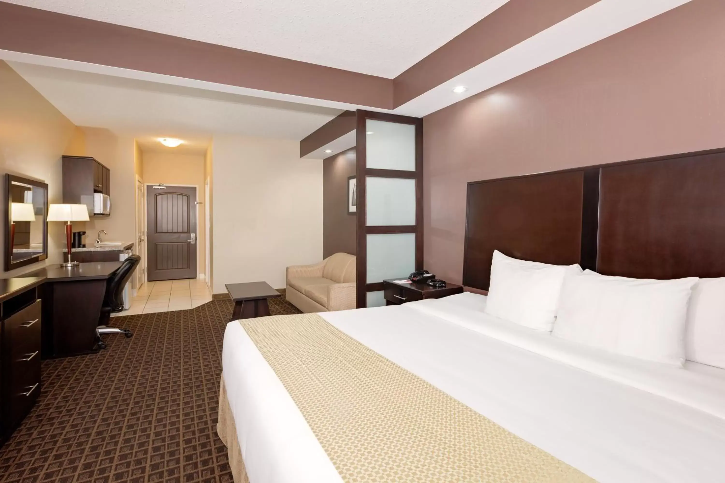Coffee/tea facilities, Bed in Ramada by Wyndham Cold Lake
