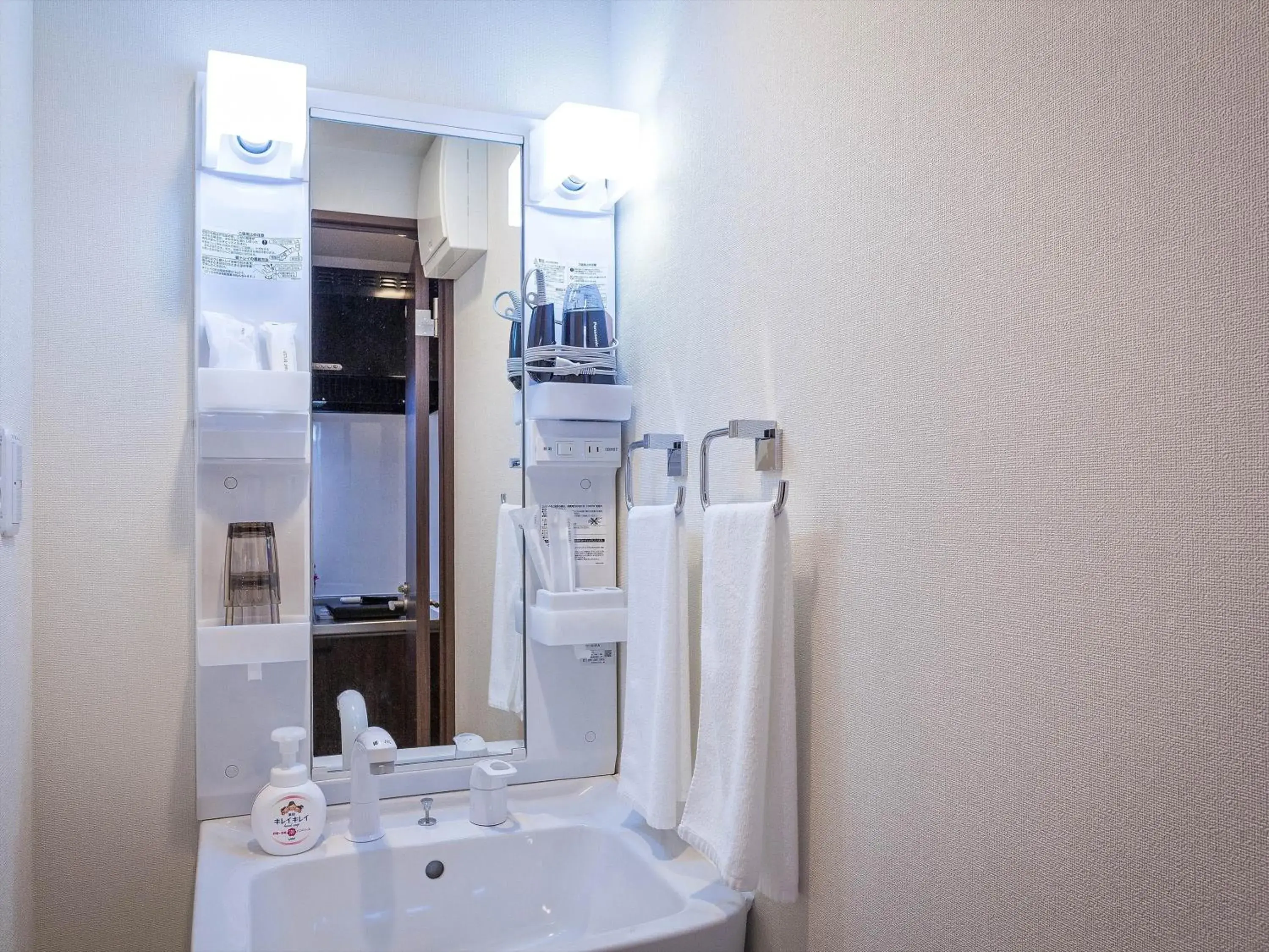 Bathroom in Kariyushi COndominium Resort Naha Living Inn Asahibashiekimae Annex and Premier