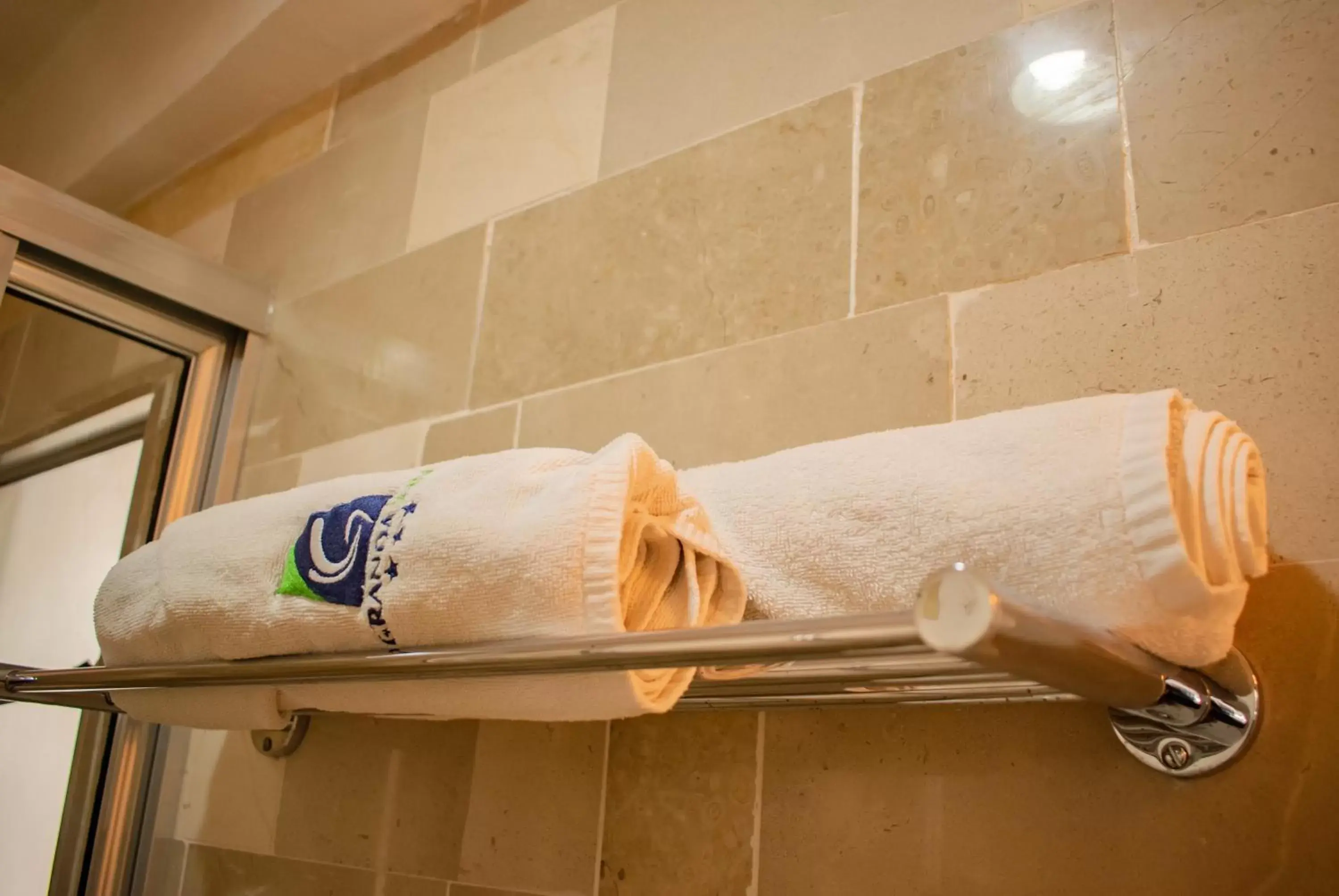 towels, Bathroom in Hotel Granda Inn