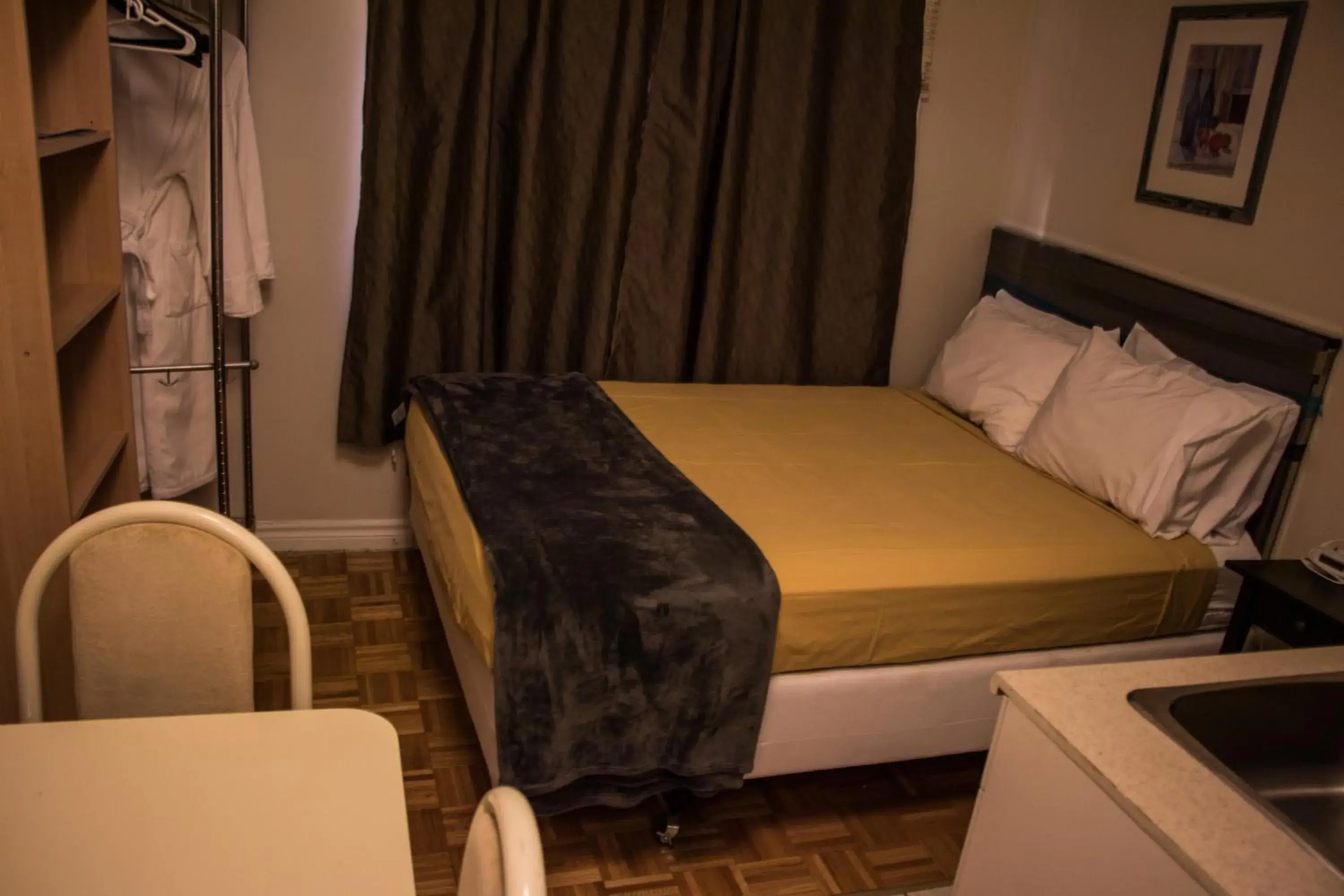 Bed in Saint Lawrence Residences and Suites