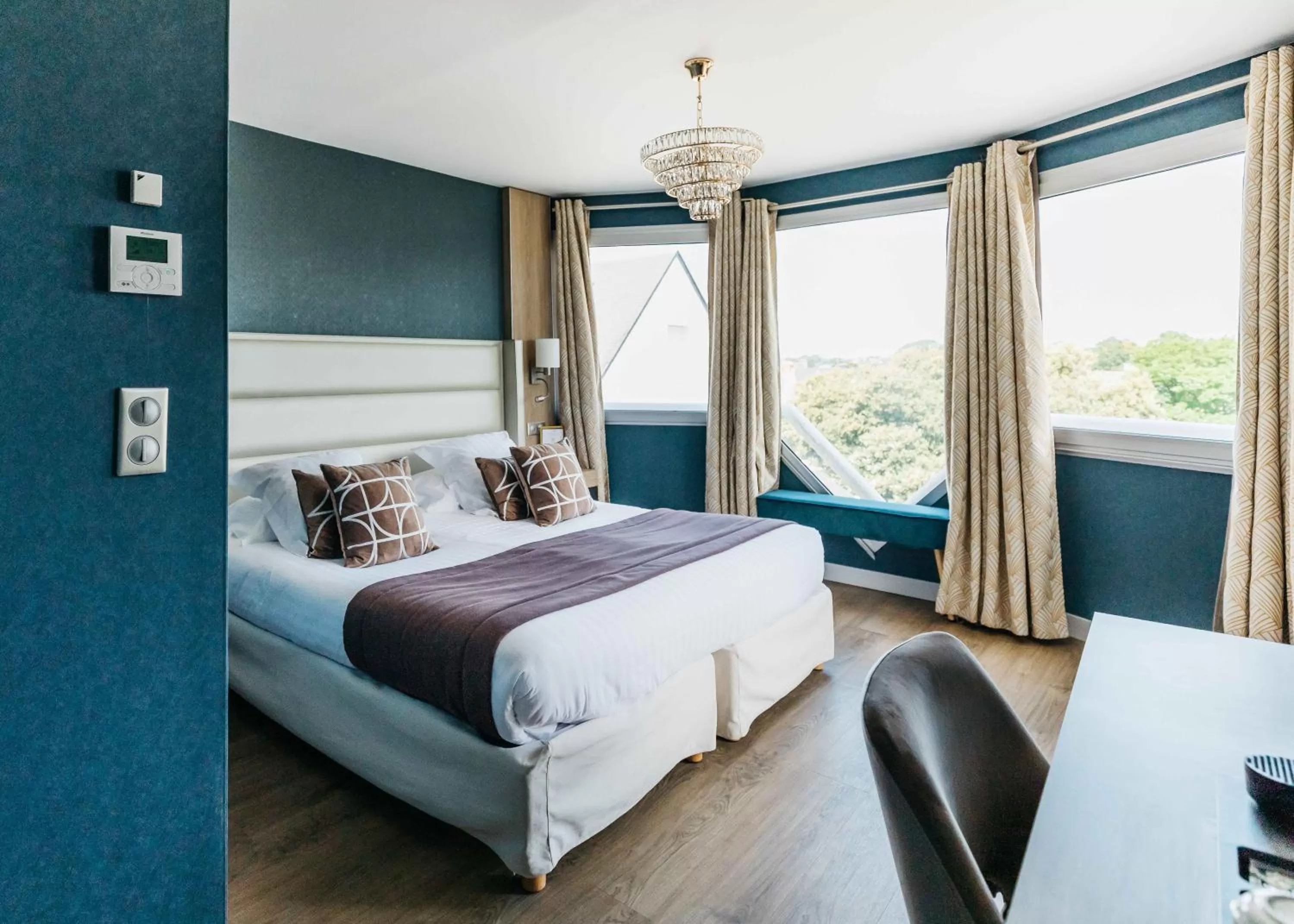 Bed in Le Diana Hôtel & Spa