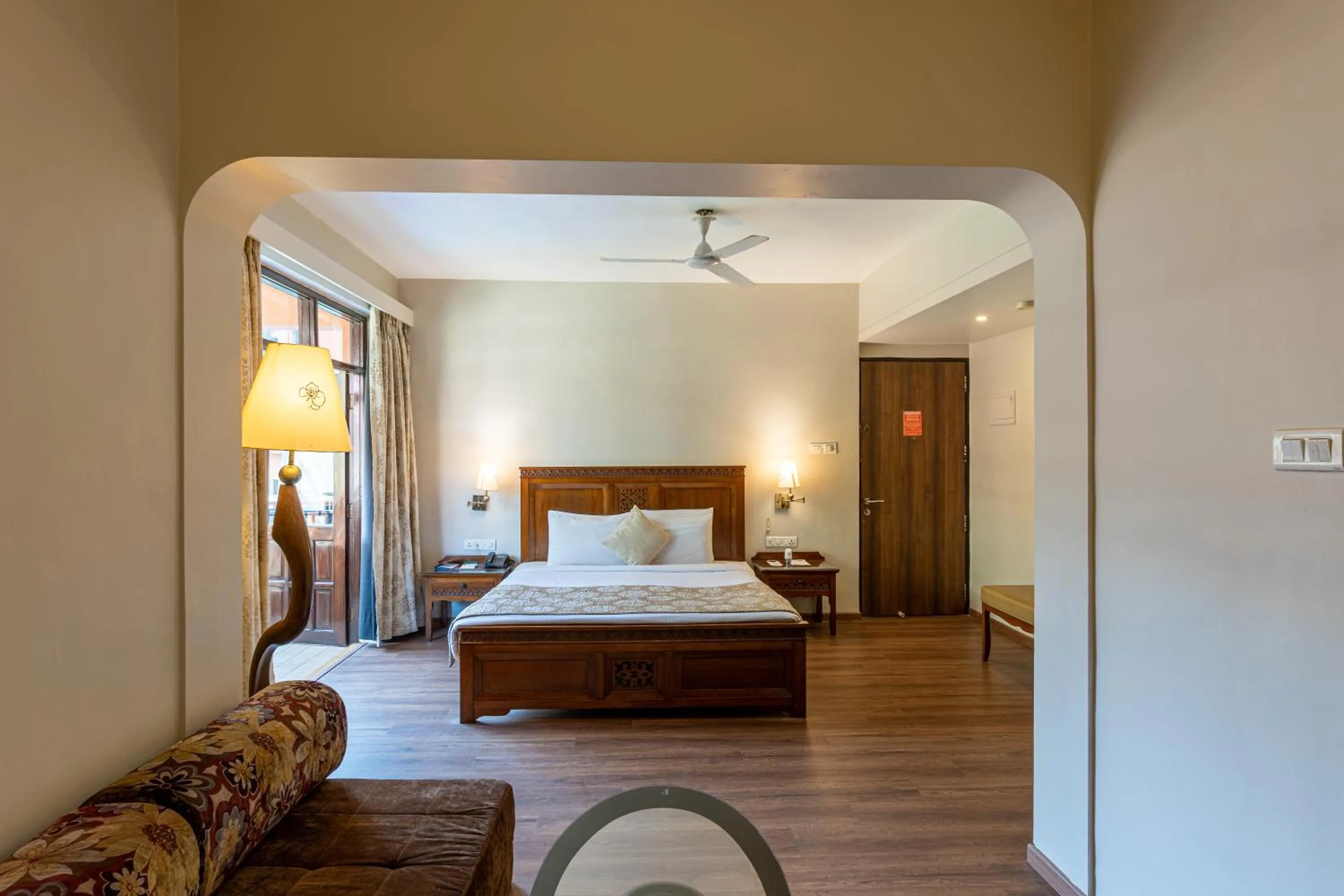 Living room, Bed in Neelam's The Grand Hotel Goa