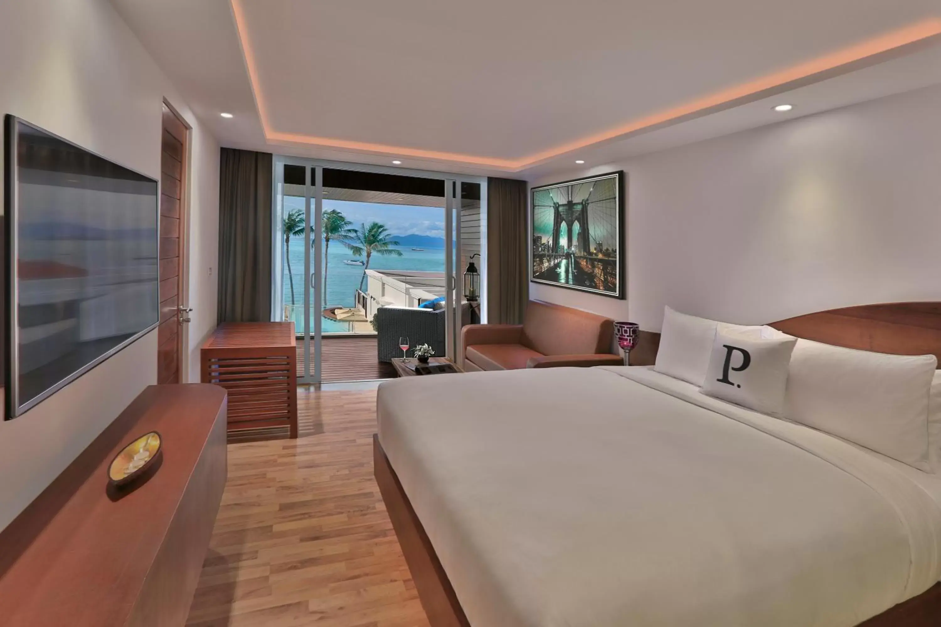 Bed in The Privilege Hotel Ezra Beach Club Bed in The Privilege Hotel Ezra Beach Club