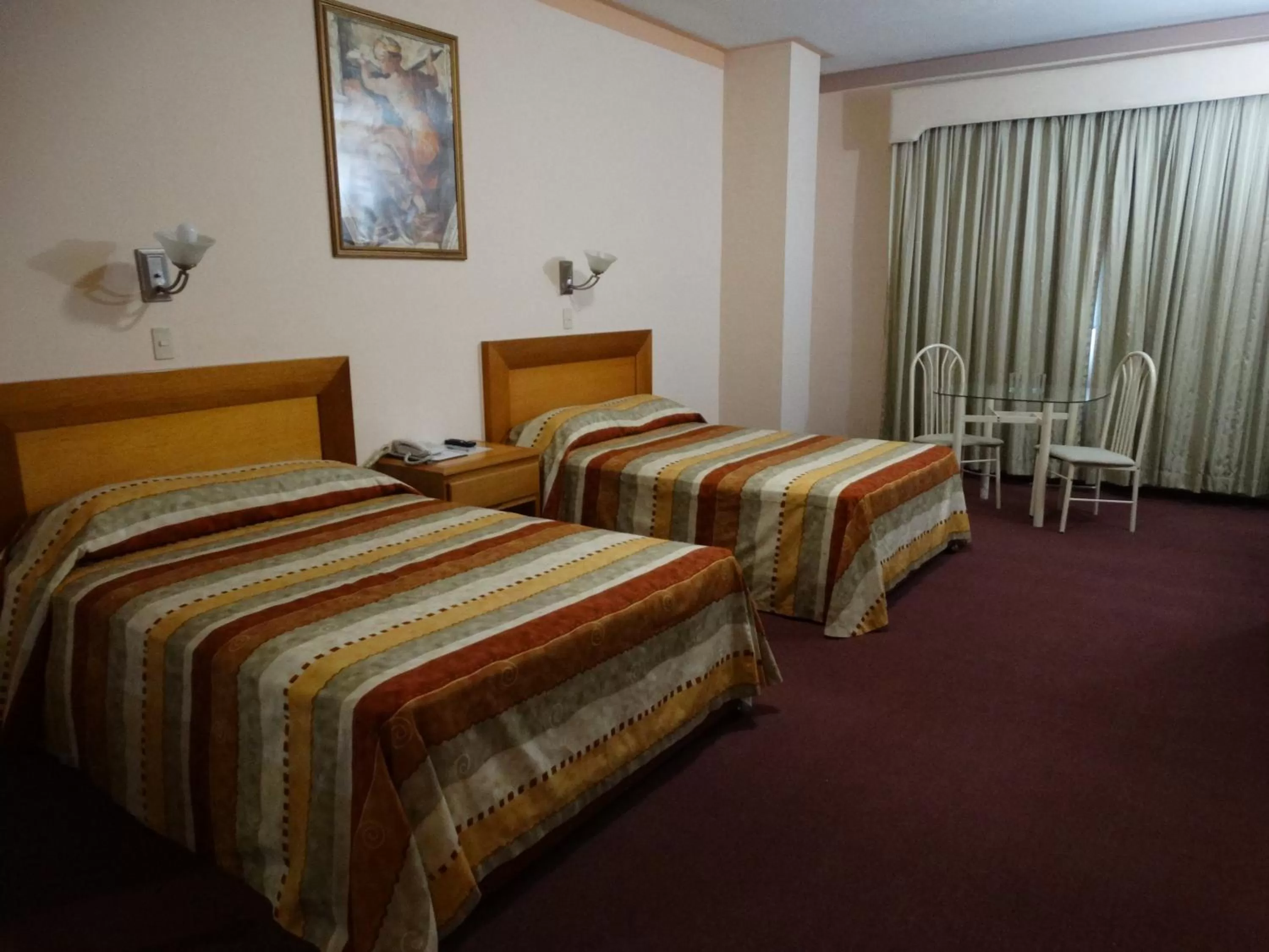 Bed in Hotel Astromundo