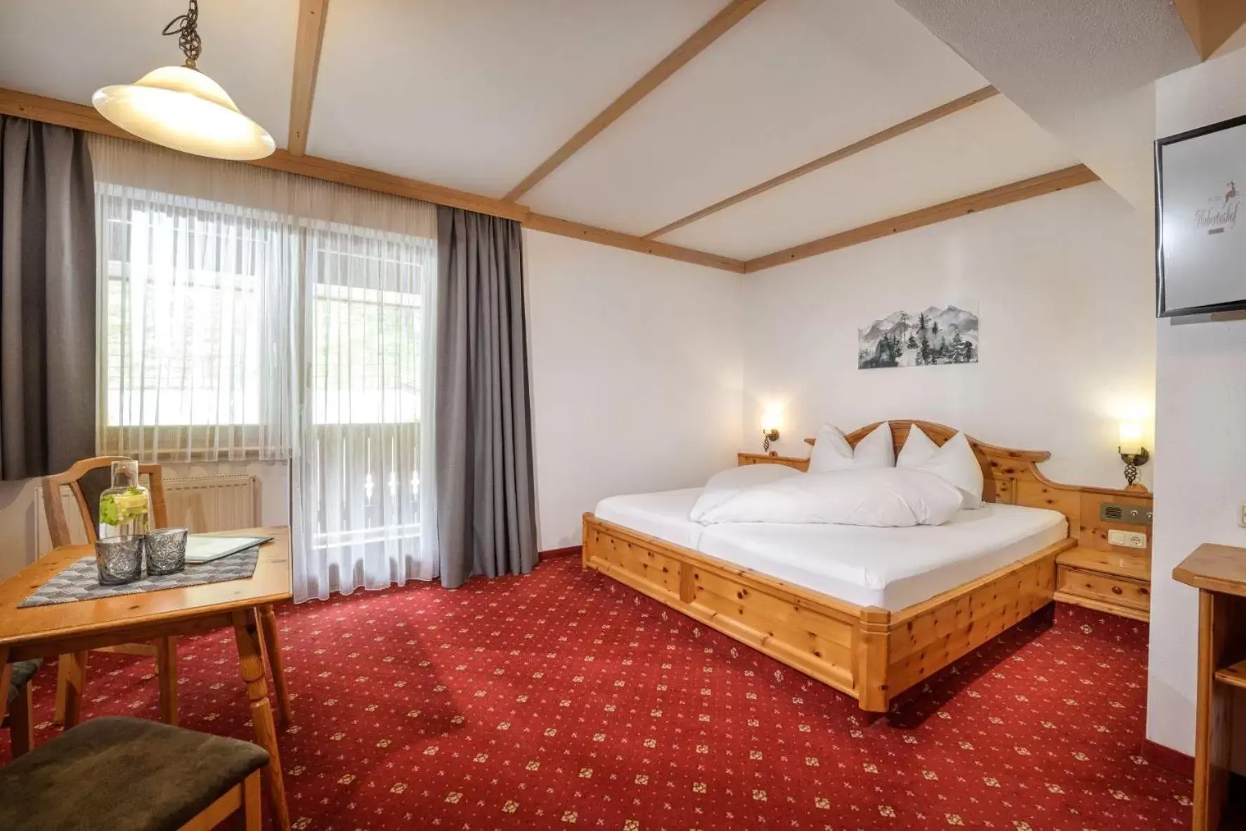 Bed in Hotel Hubertushof