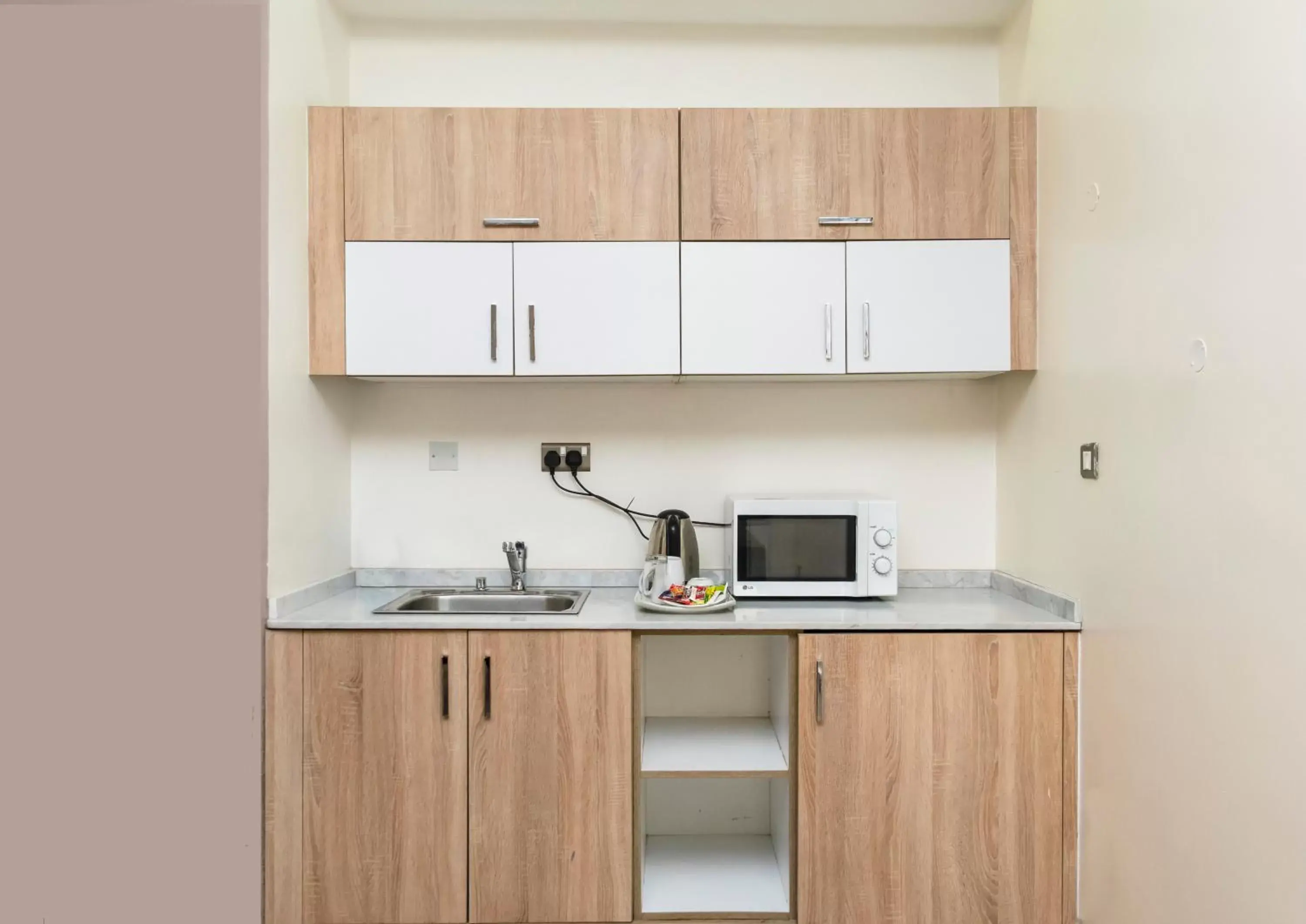 Kitchen or kitchenette, Kitchen/Kitchenette in Hawthorn Suites by Wyndham Abuja