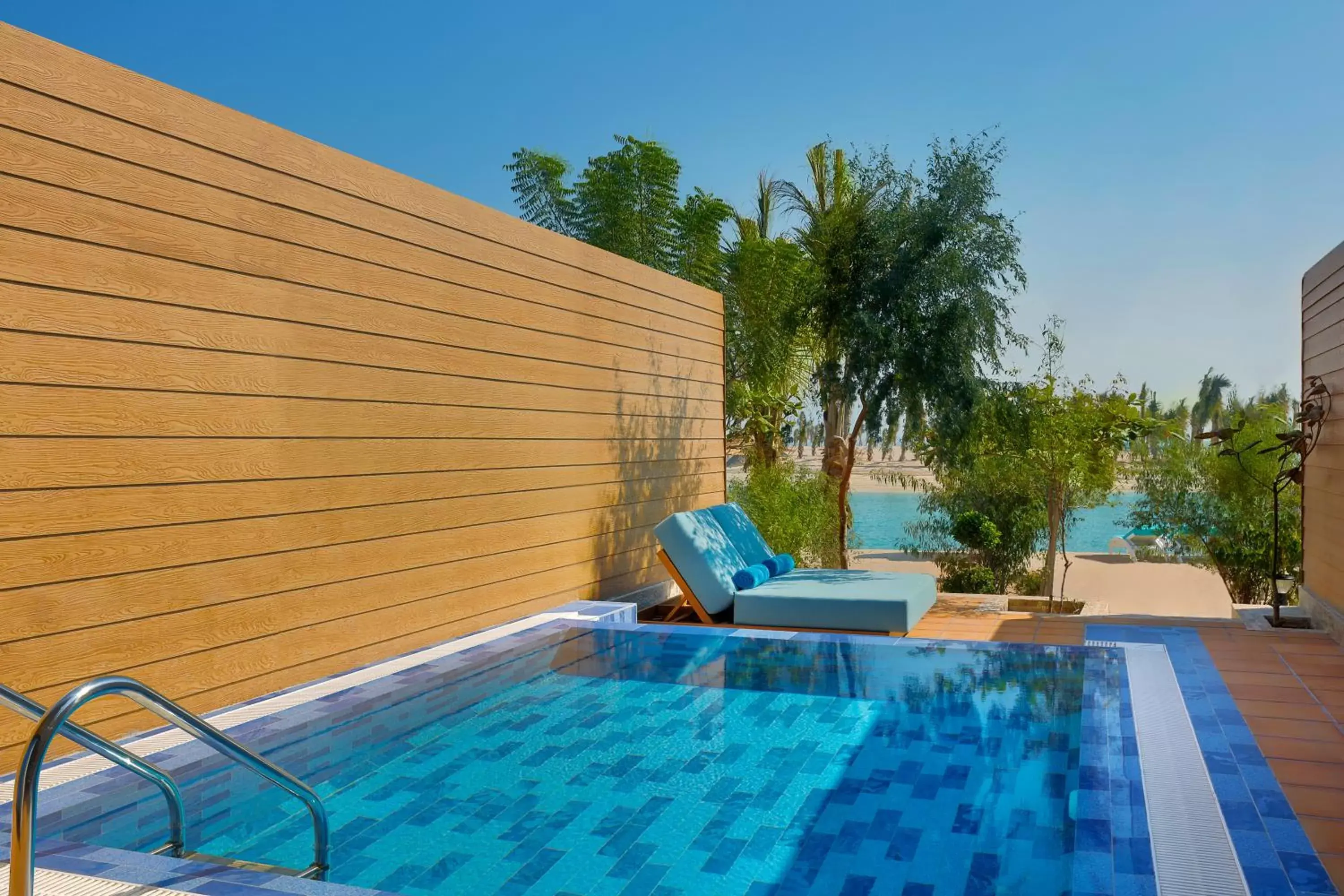 Balcony/Terrace, Swimming Pool in Anantara World Islands Dubai Resort