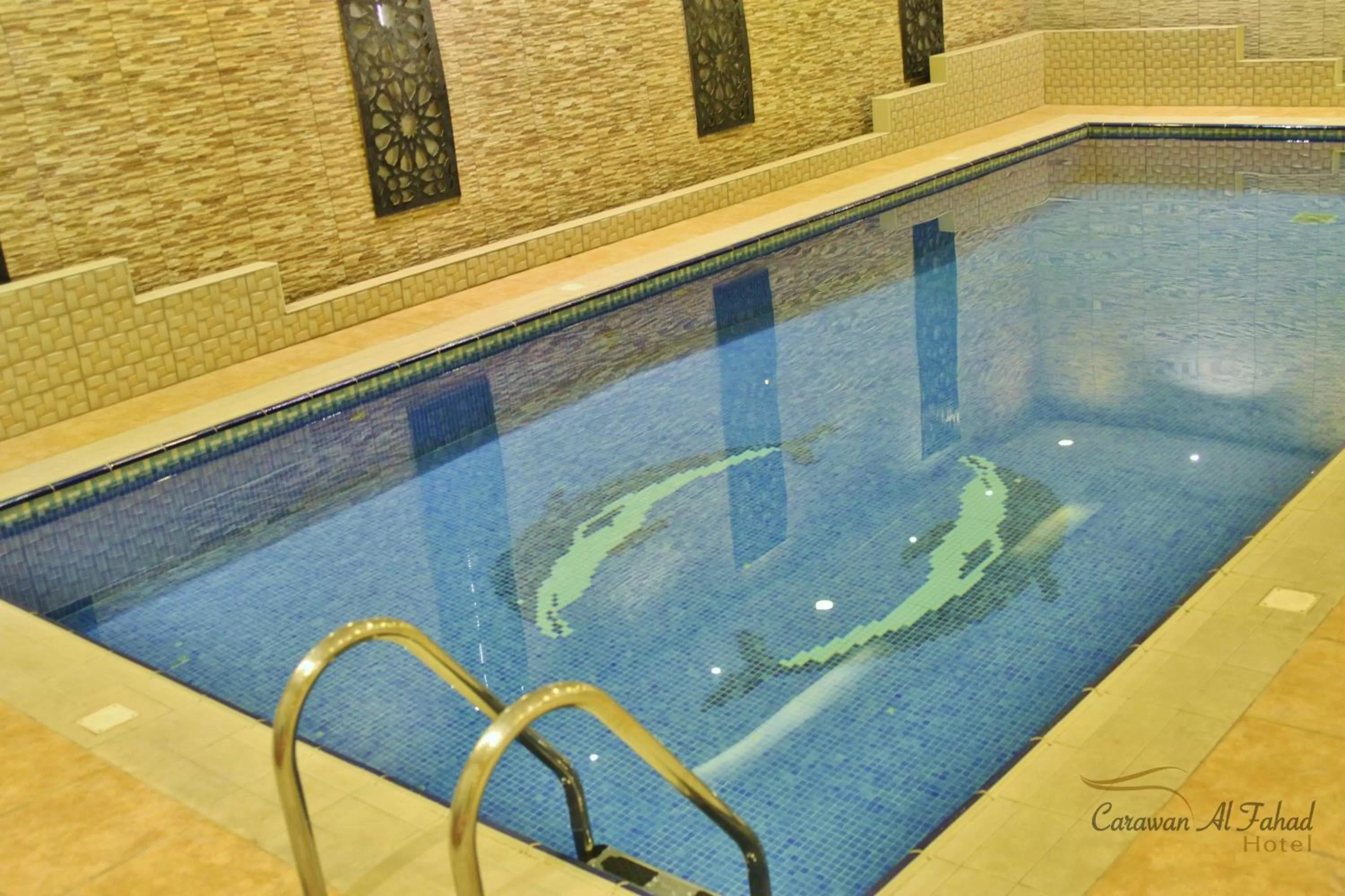 Swimming pool in Carawan Al Fahad Hotel