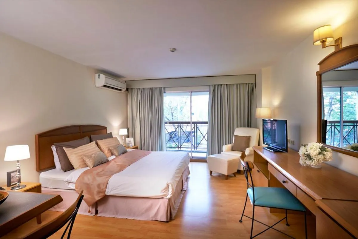 Photo of the whole room, Bed in Ravipha Residences