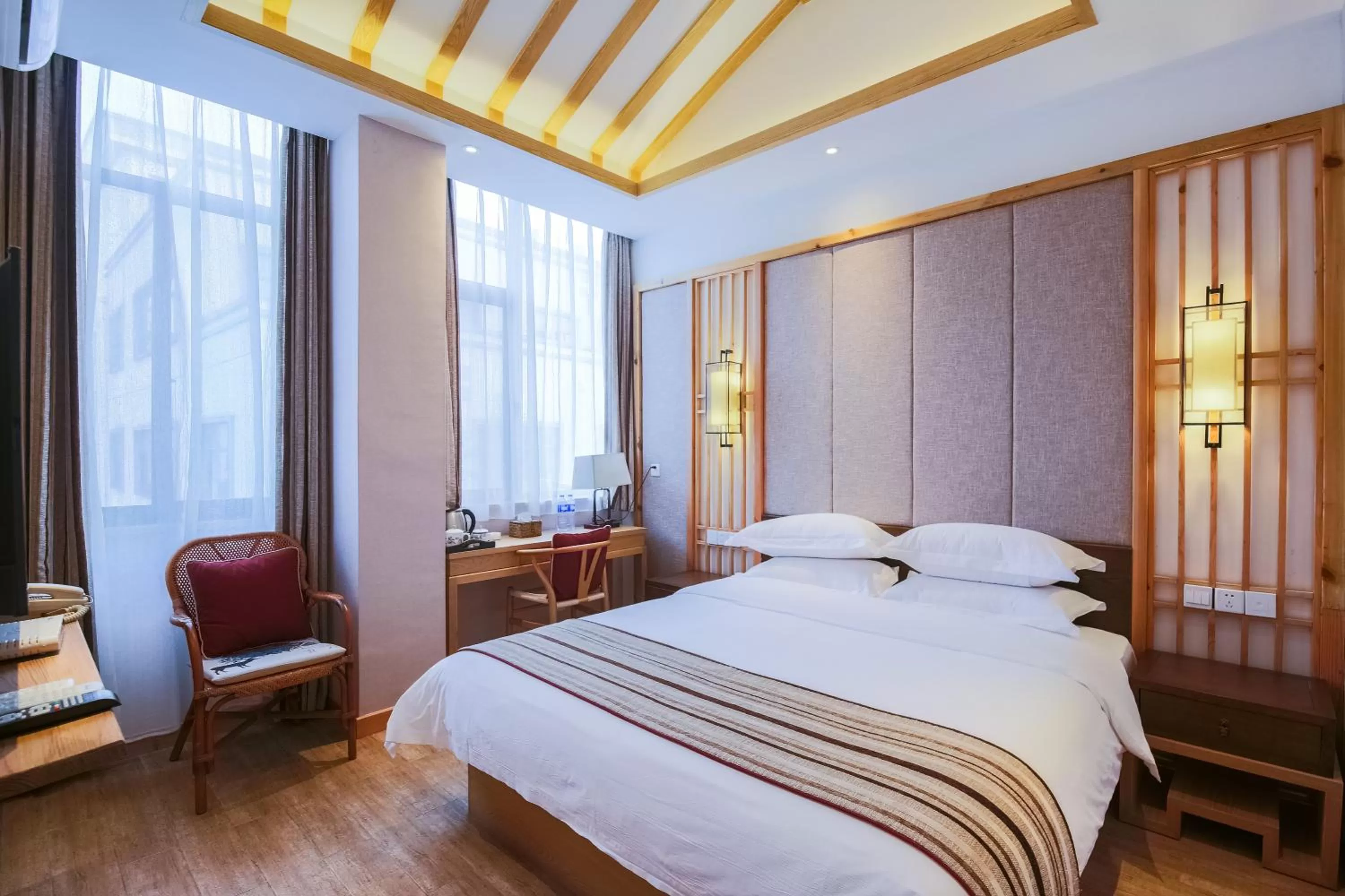 Photo of the whole room, Bed in Mild Spring Boutique Hotel