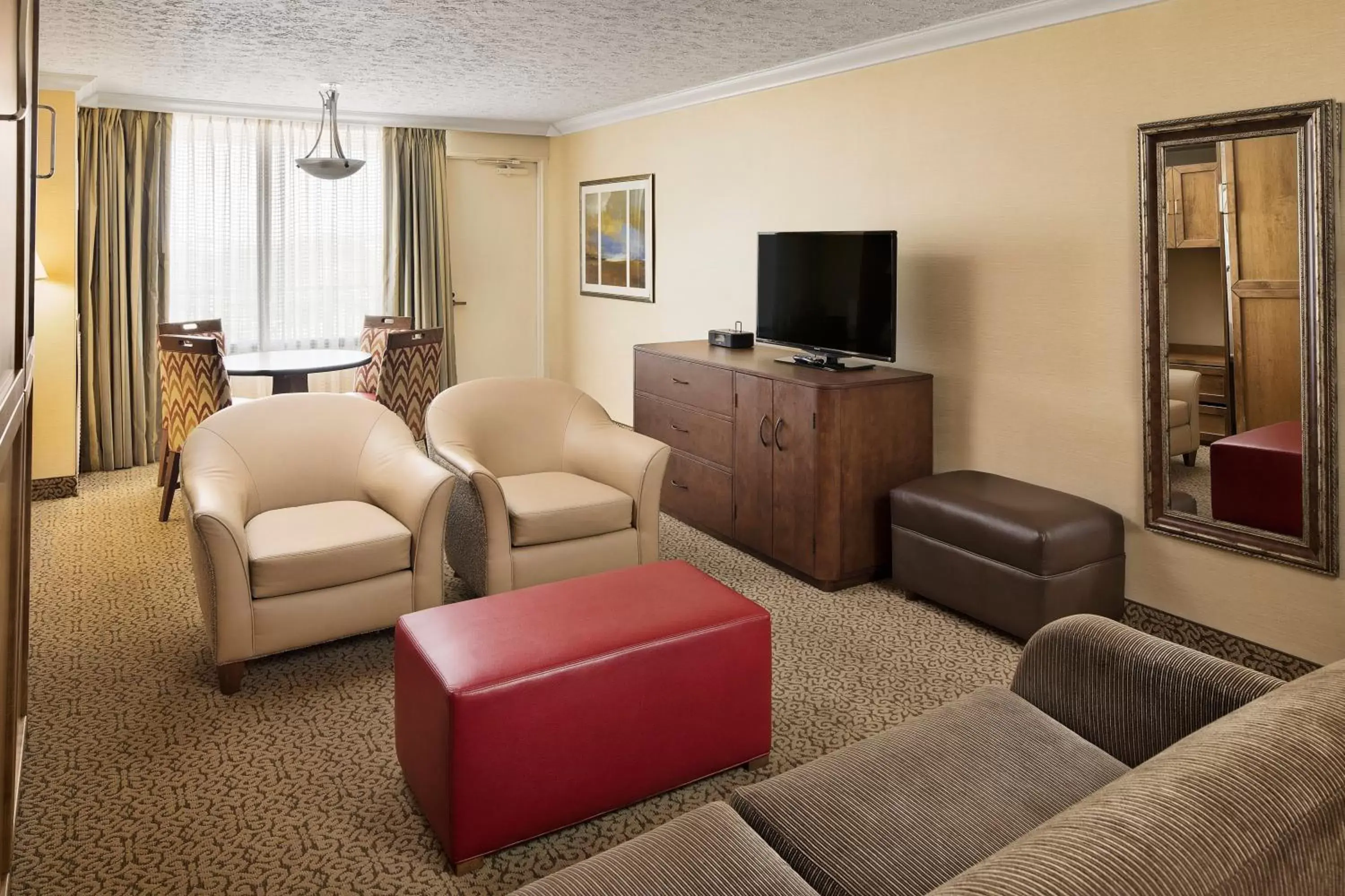 Photo of the whole room, Seating Area in Crowne Plaza Louisville Airport Expo Center, an IHG Hotel