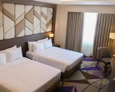 Bed in Luxent Hotel