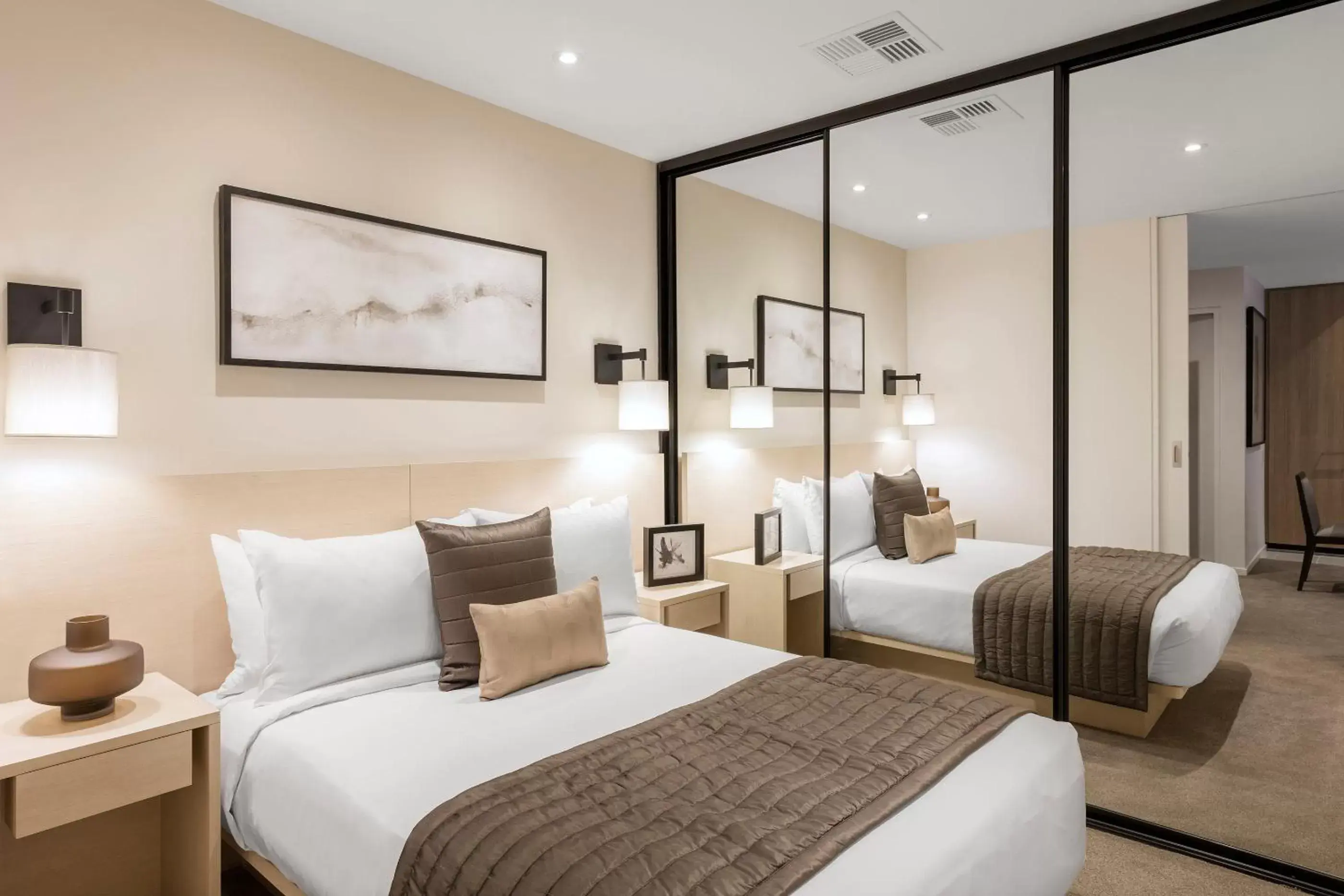 Bed in SKYE Hotel Suites Parramatta