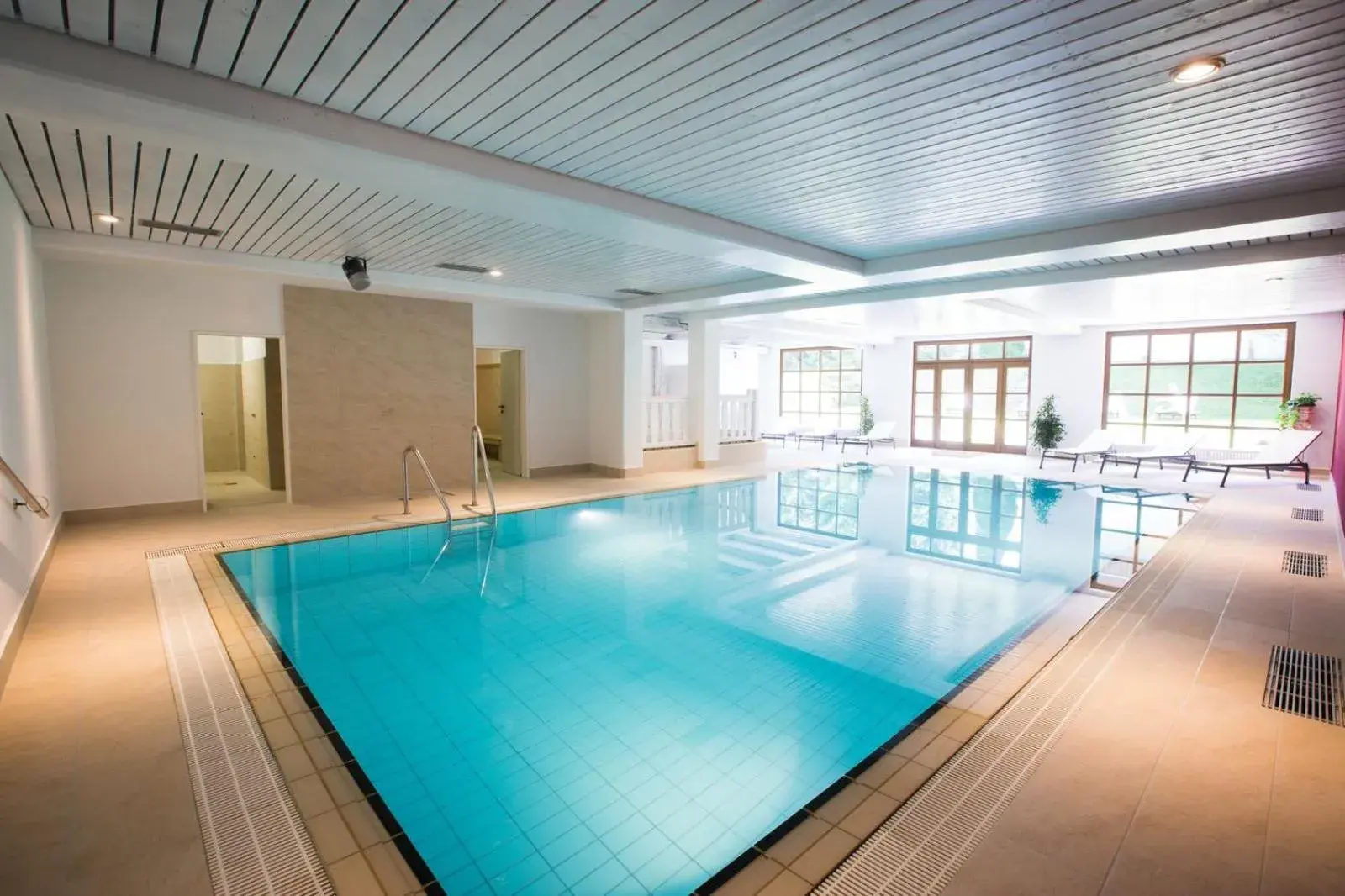 Swimming Pool in Das Bergmayr - Chiemgauer Alpenhotel