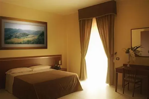 Bed in Hotel Ruffirio