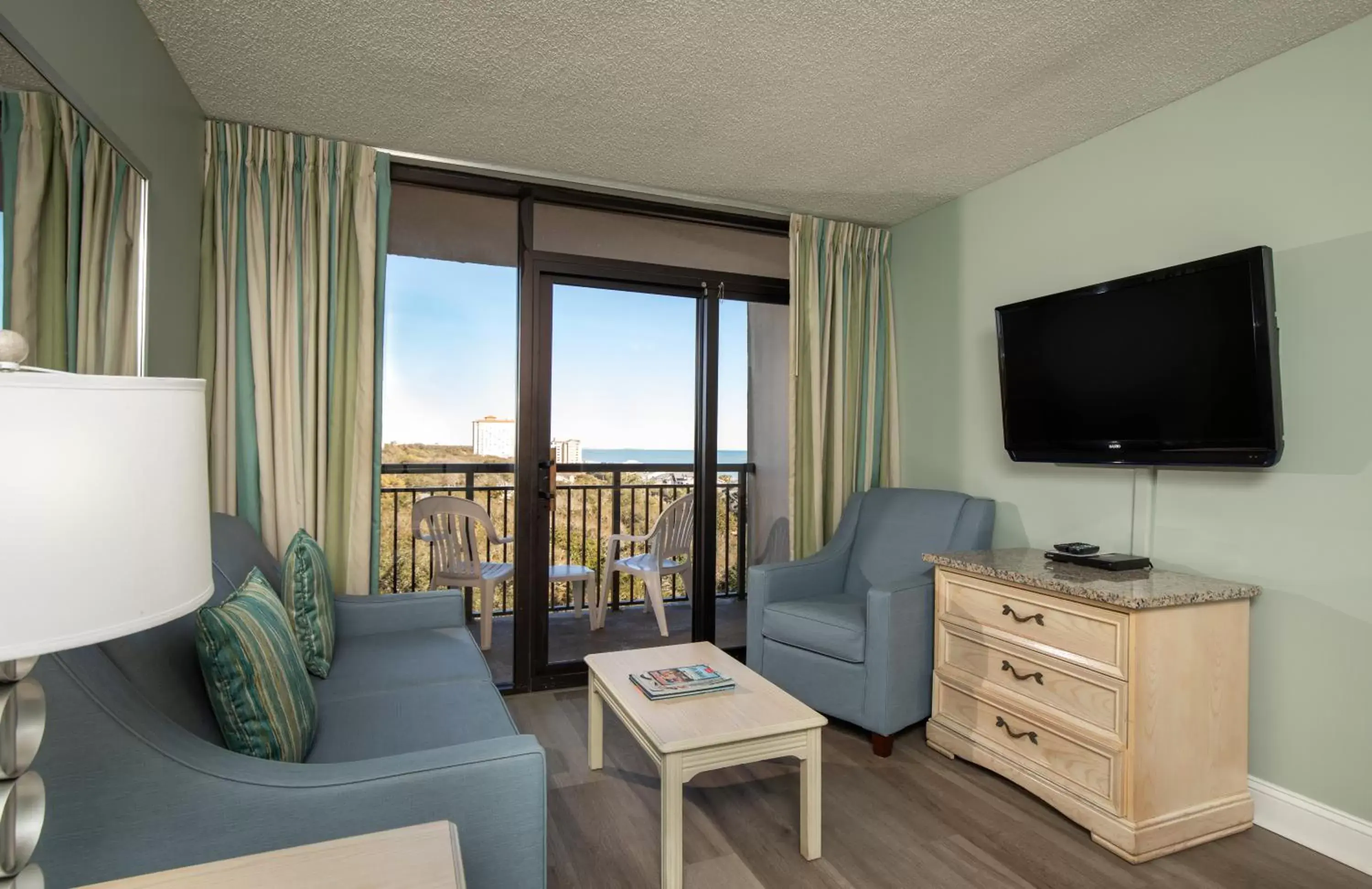 Living room, TV/Entertainment Center in Grande Shores Ocean Resorts Condominiums