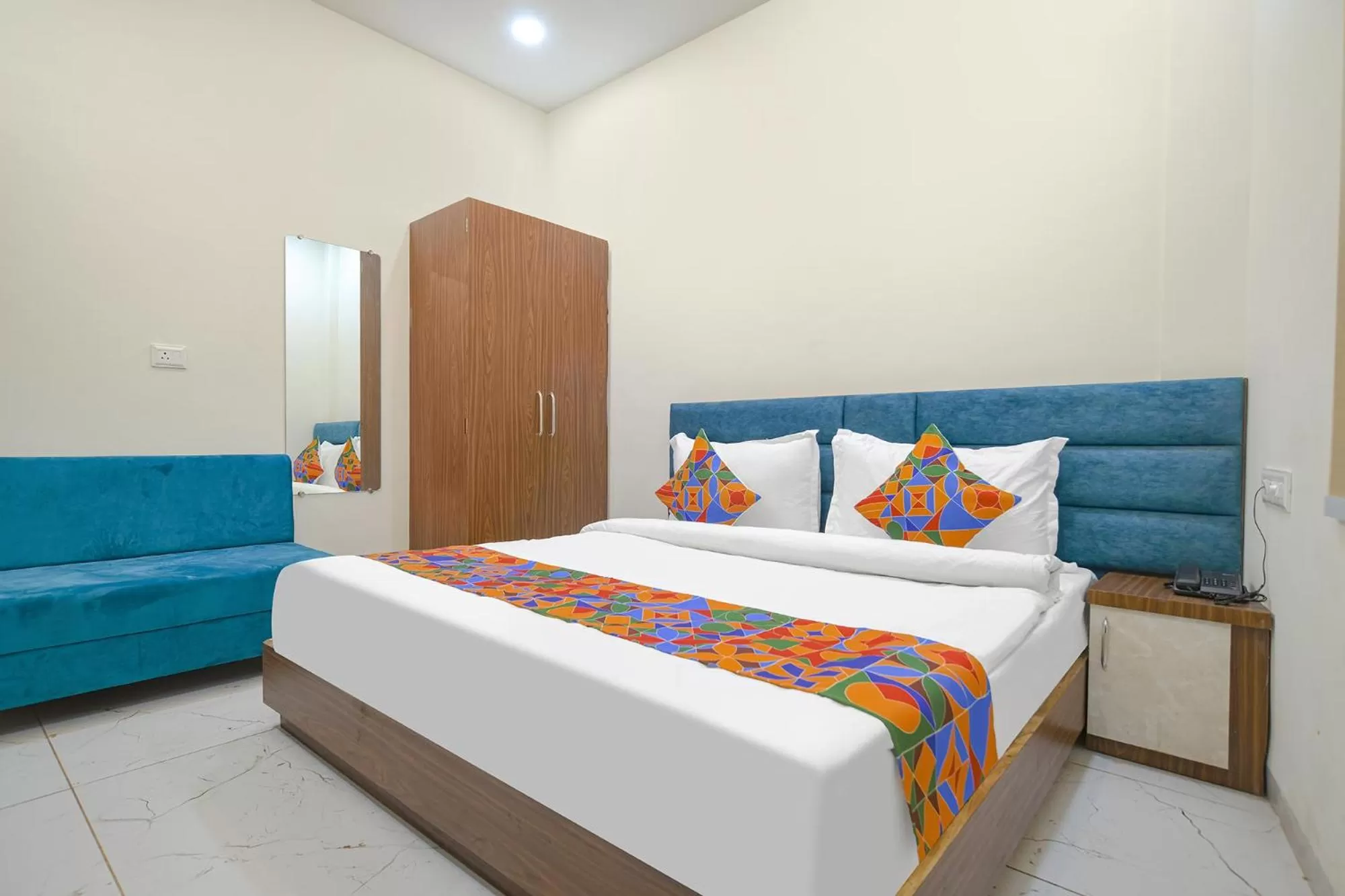 Bed in FabHotel Ramya
