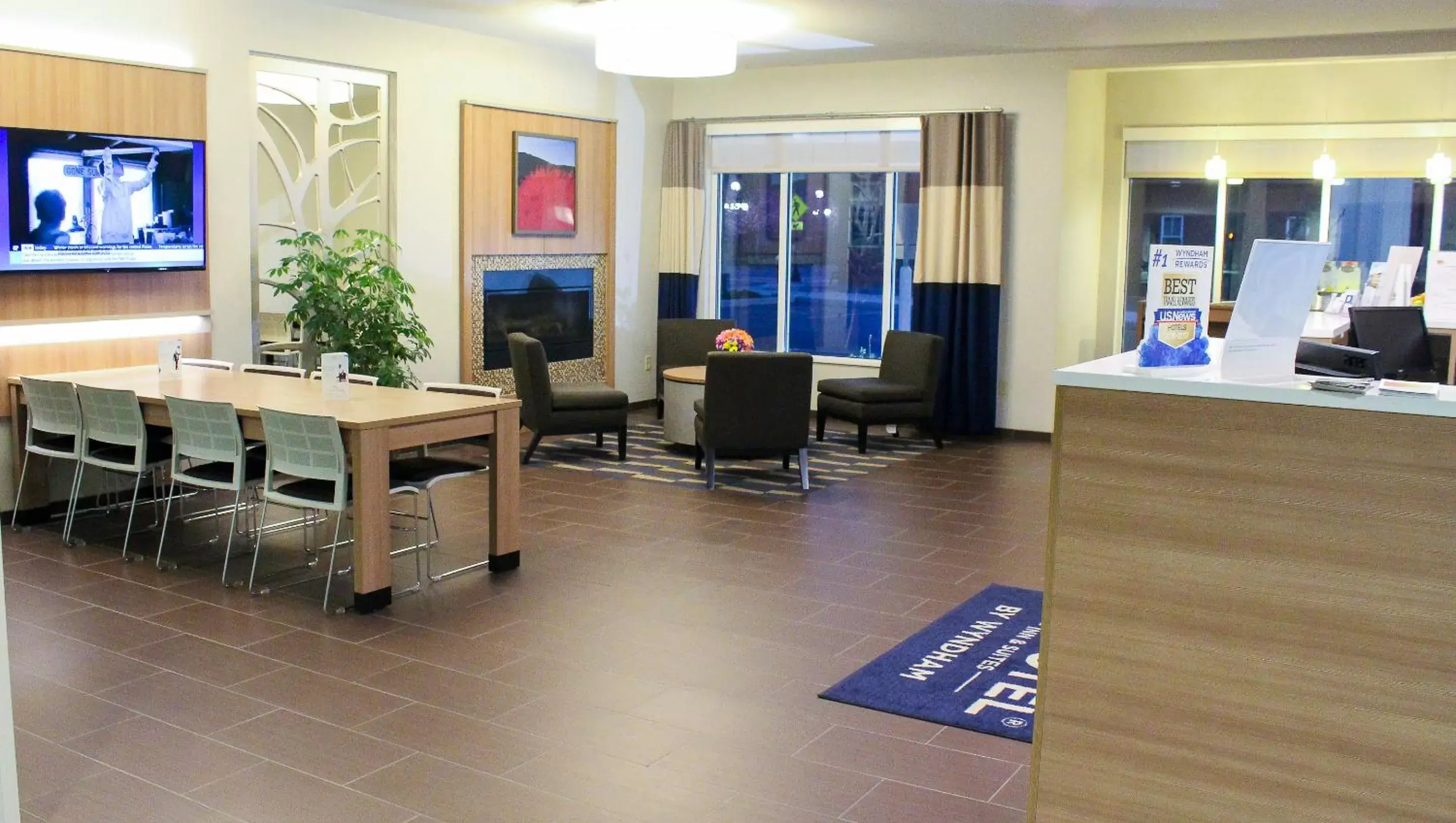 Communal lounge/ TV room, Lobby/Reception in Microtel Inn & Suites by Wyndham - Penn Yan