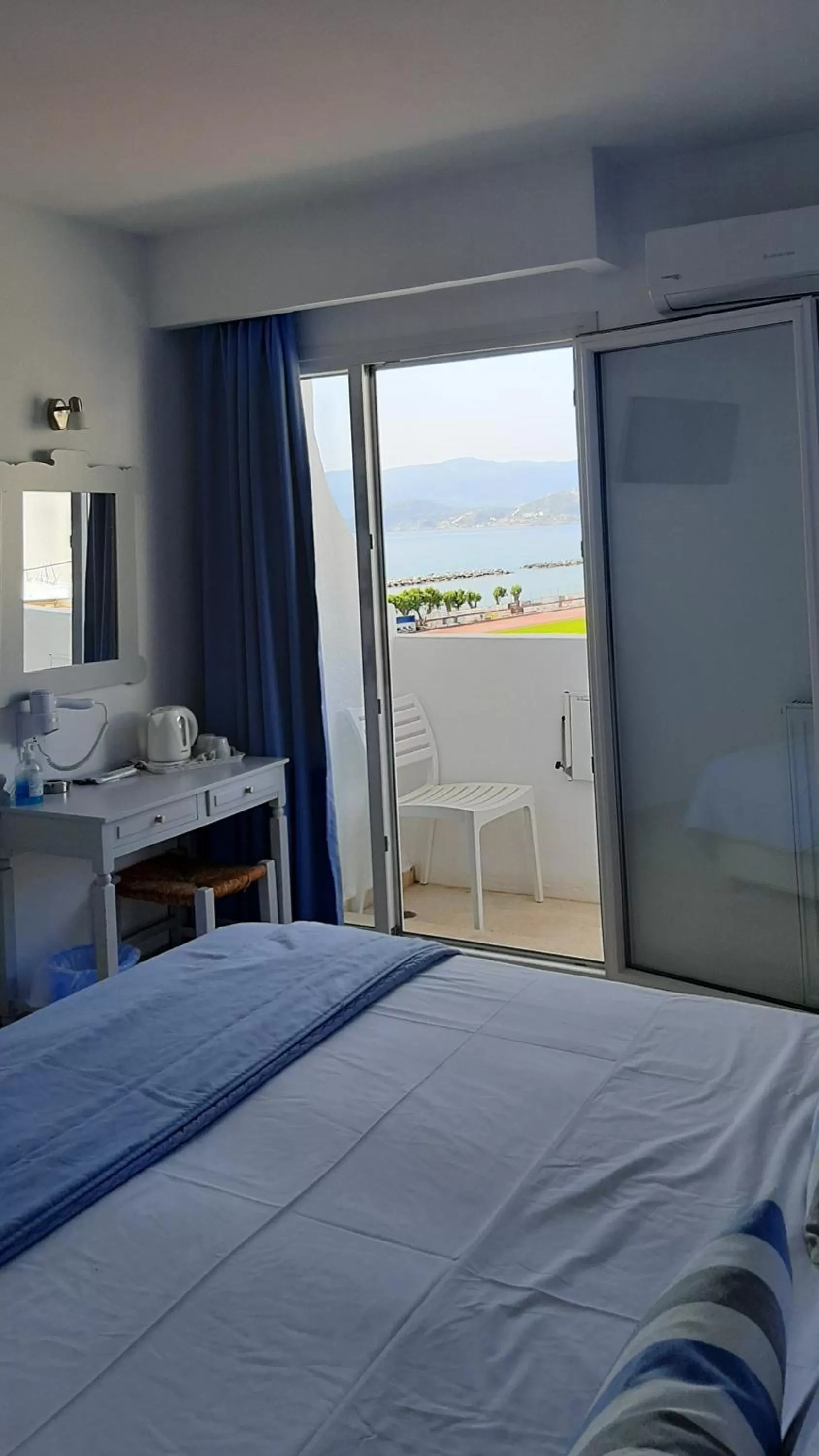 Bed in Naiades Marina Hotel