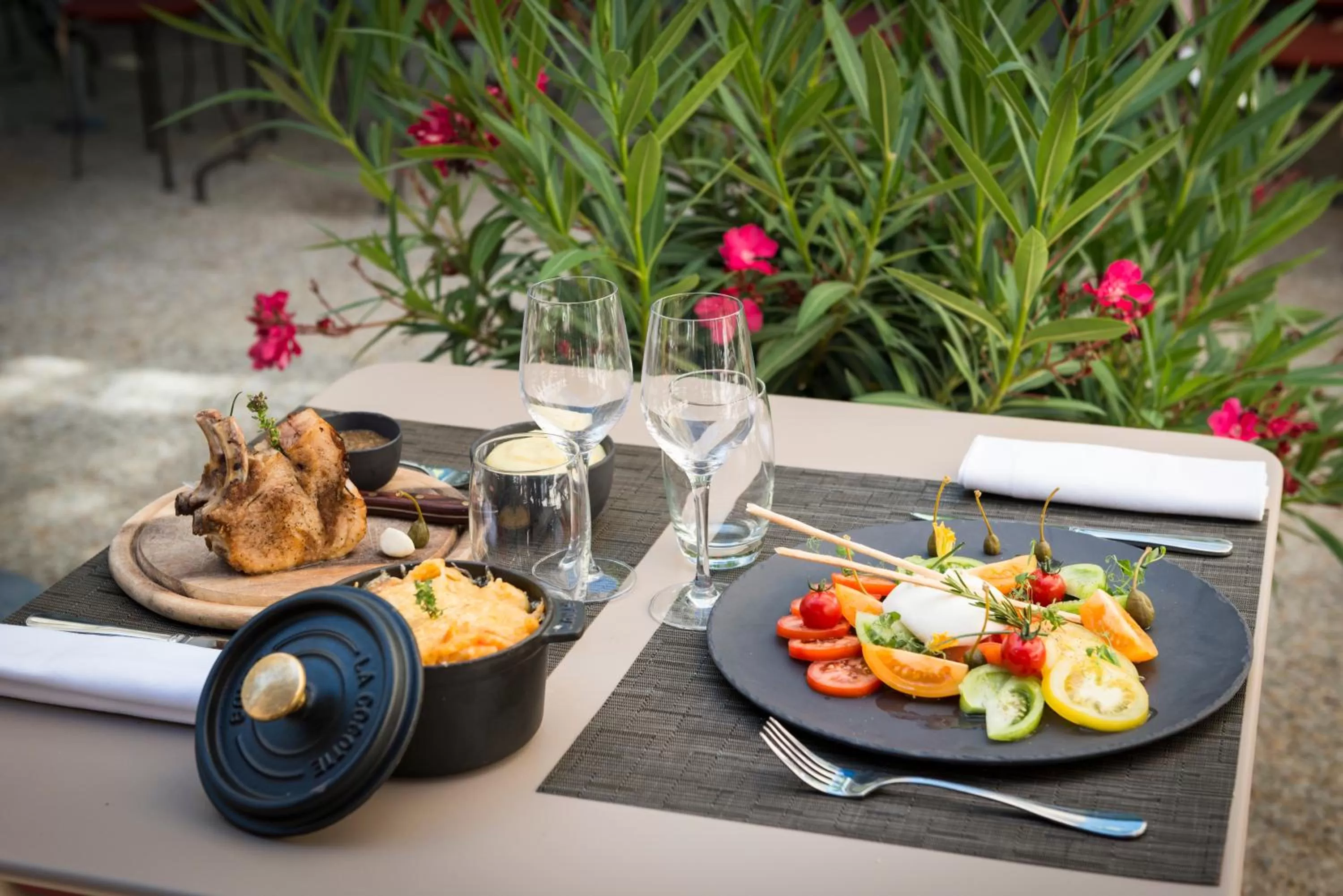 Patio in Hôtel Aux Vieux Remparts, The Originals Relais