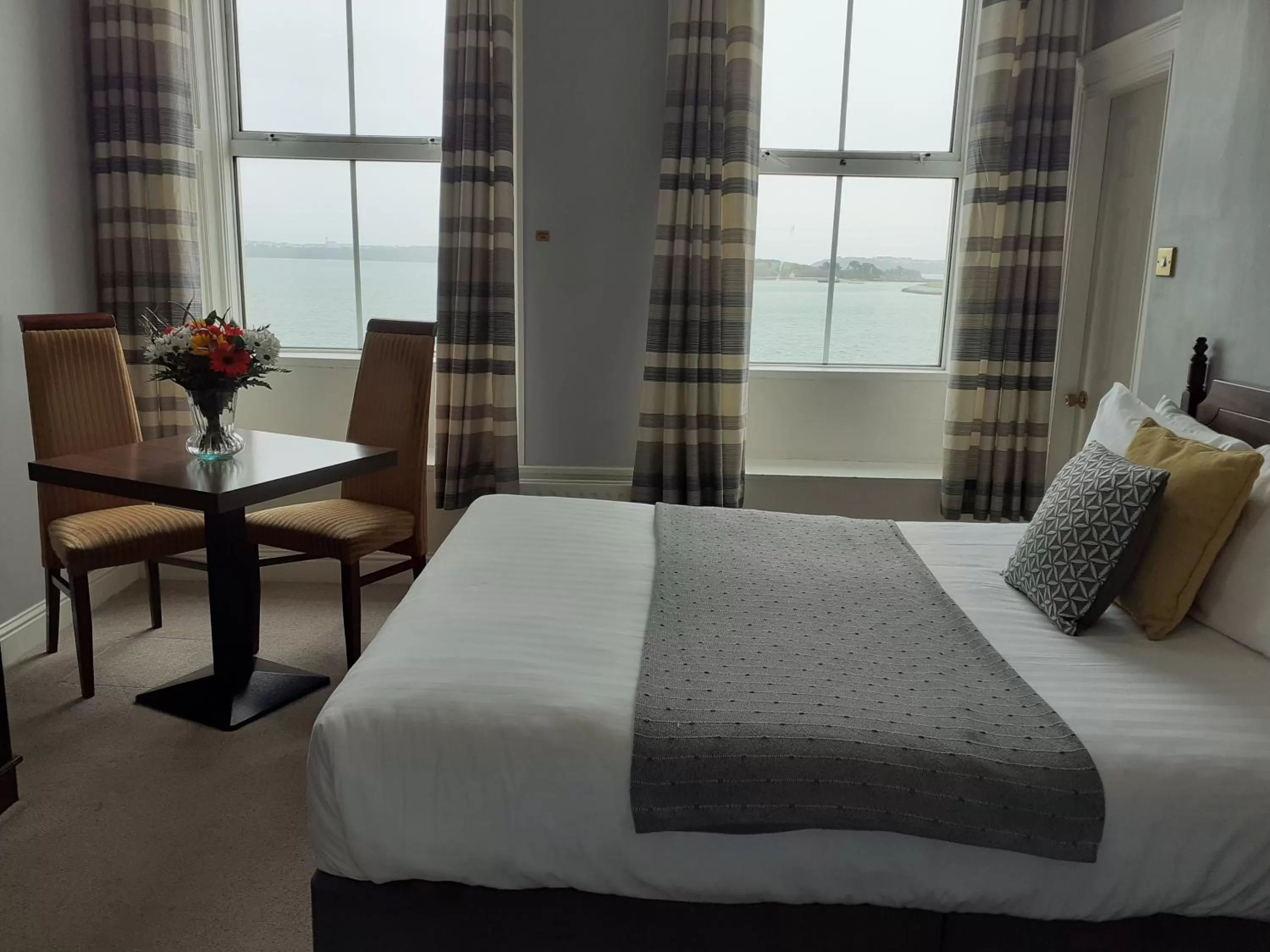 Bed in Commodore Hotel