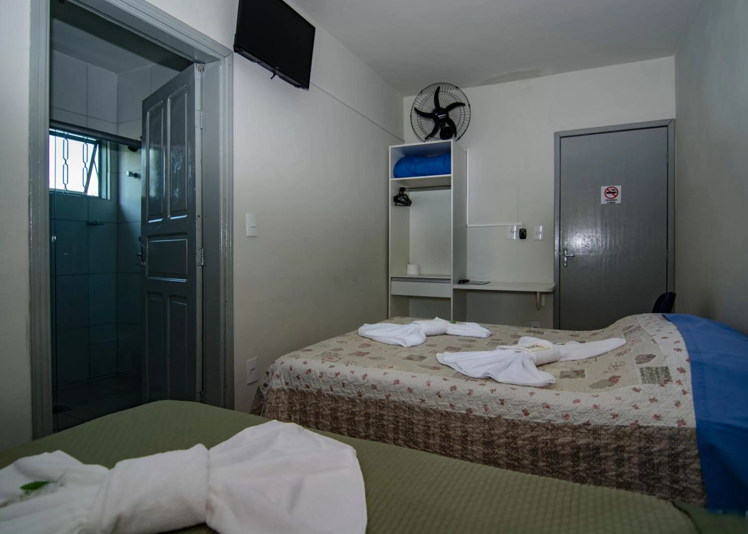 Bed in Pousada Araxá