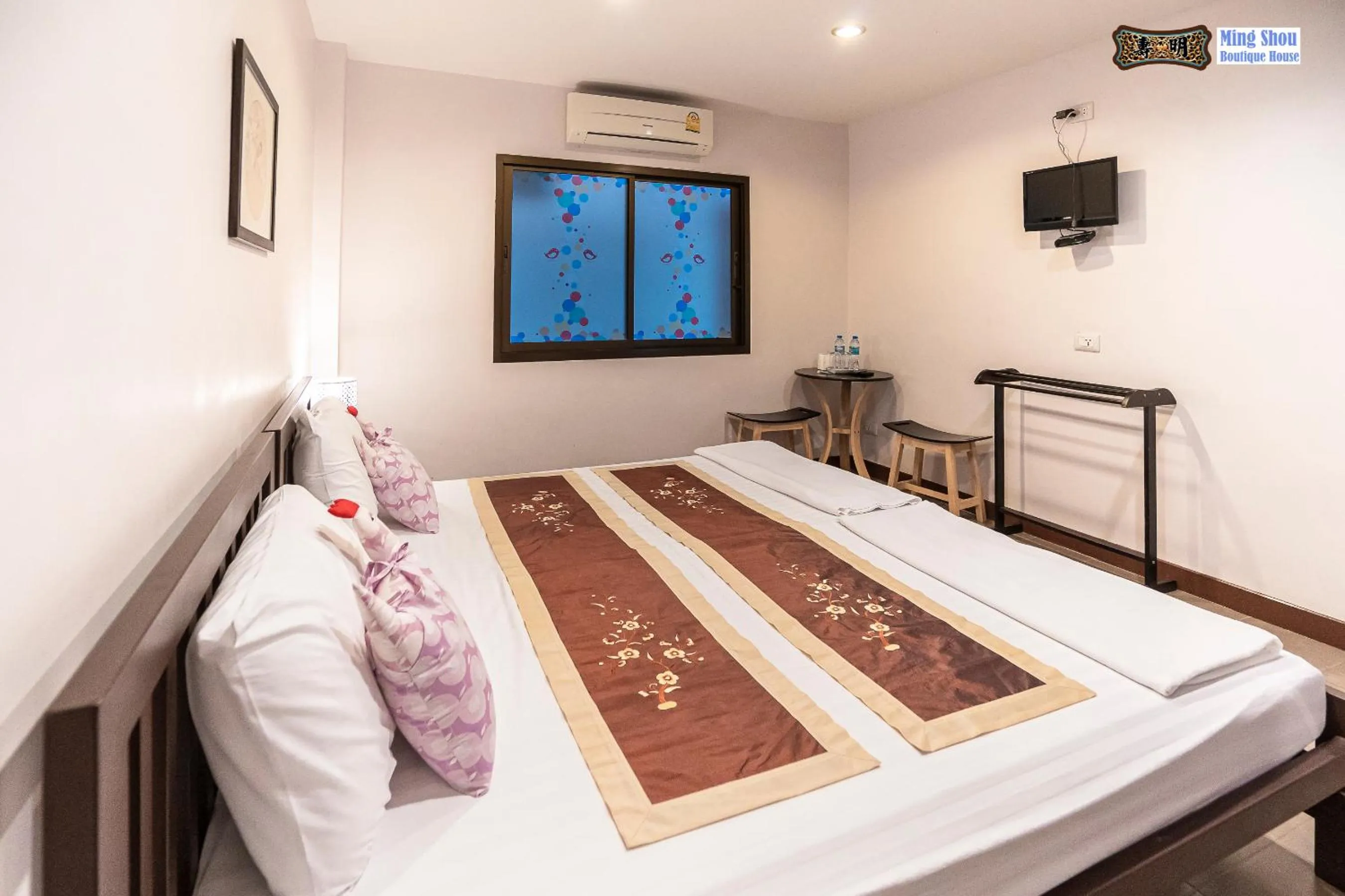 Bed in Ming Shou Boutique House